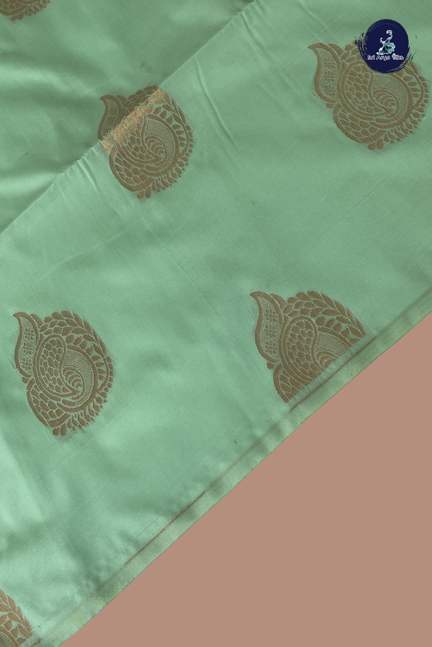 Pastel Green Semi Silk Saree With Zari Buttas Pattern