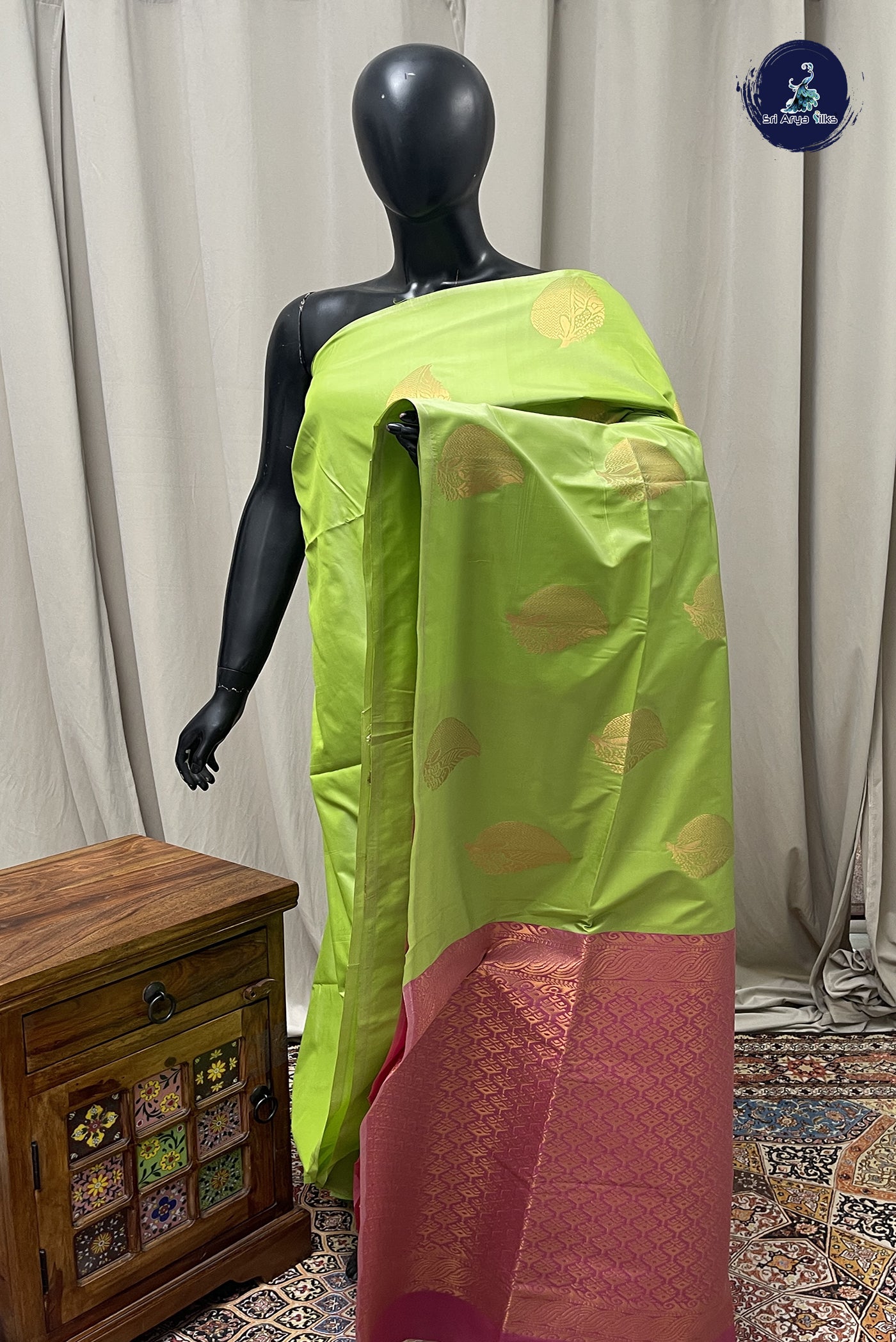 Pastel Green Semi Silk Saree With Zari Buttas Pattern