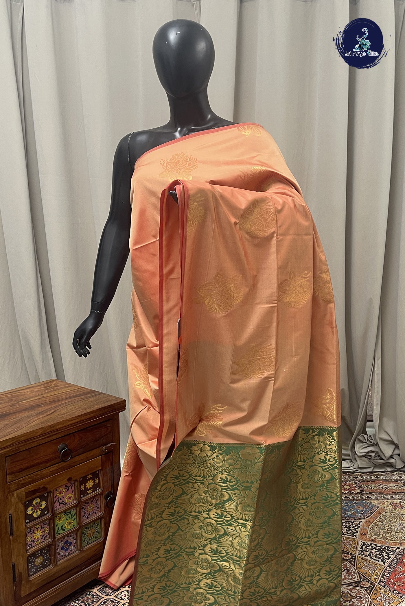 Light Peach Semi Silk Saree With Zari Buttas Pattern