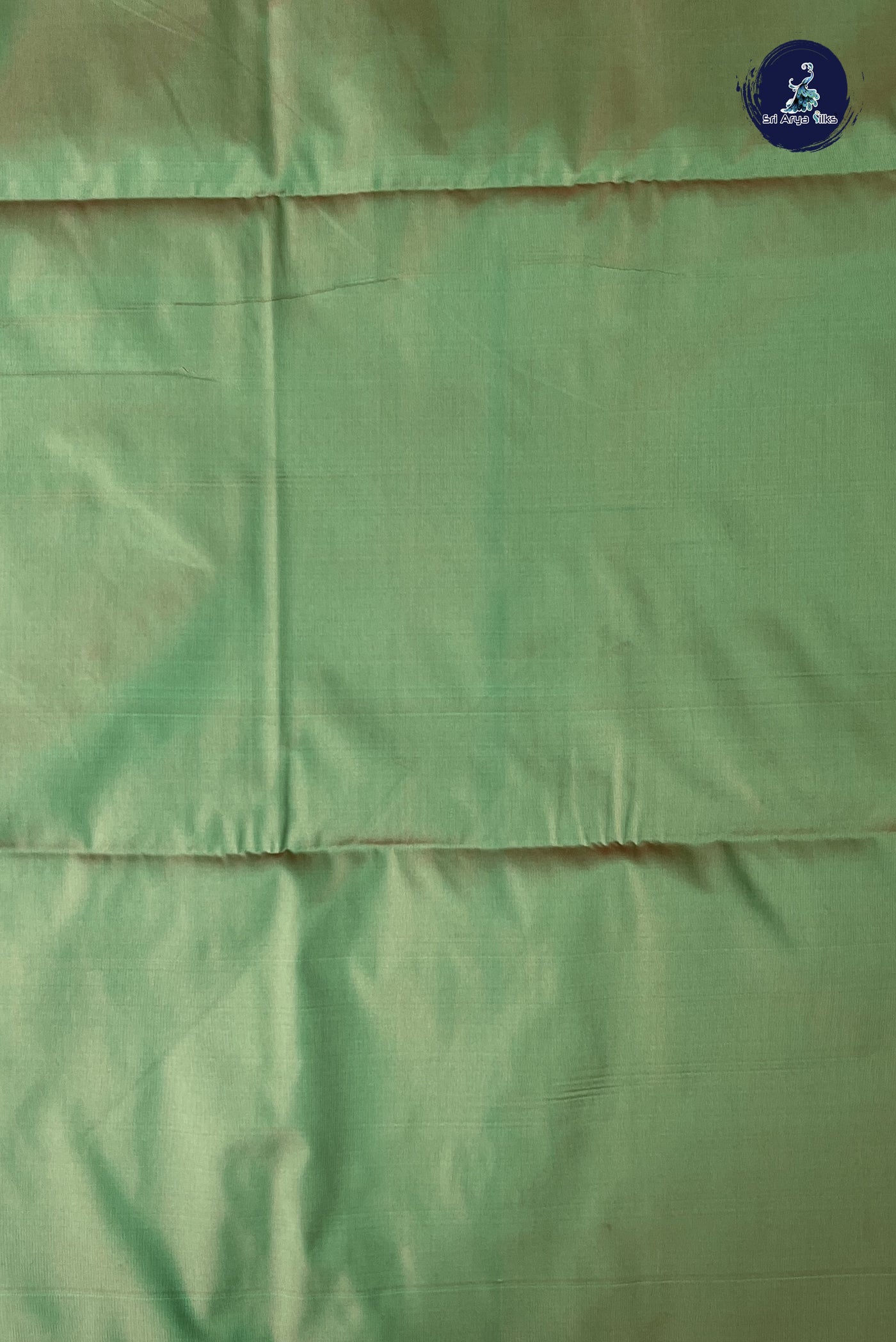 Light Peach Semi Silk Saree With Zari Buttas Pattern