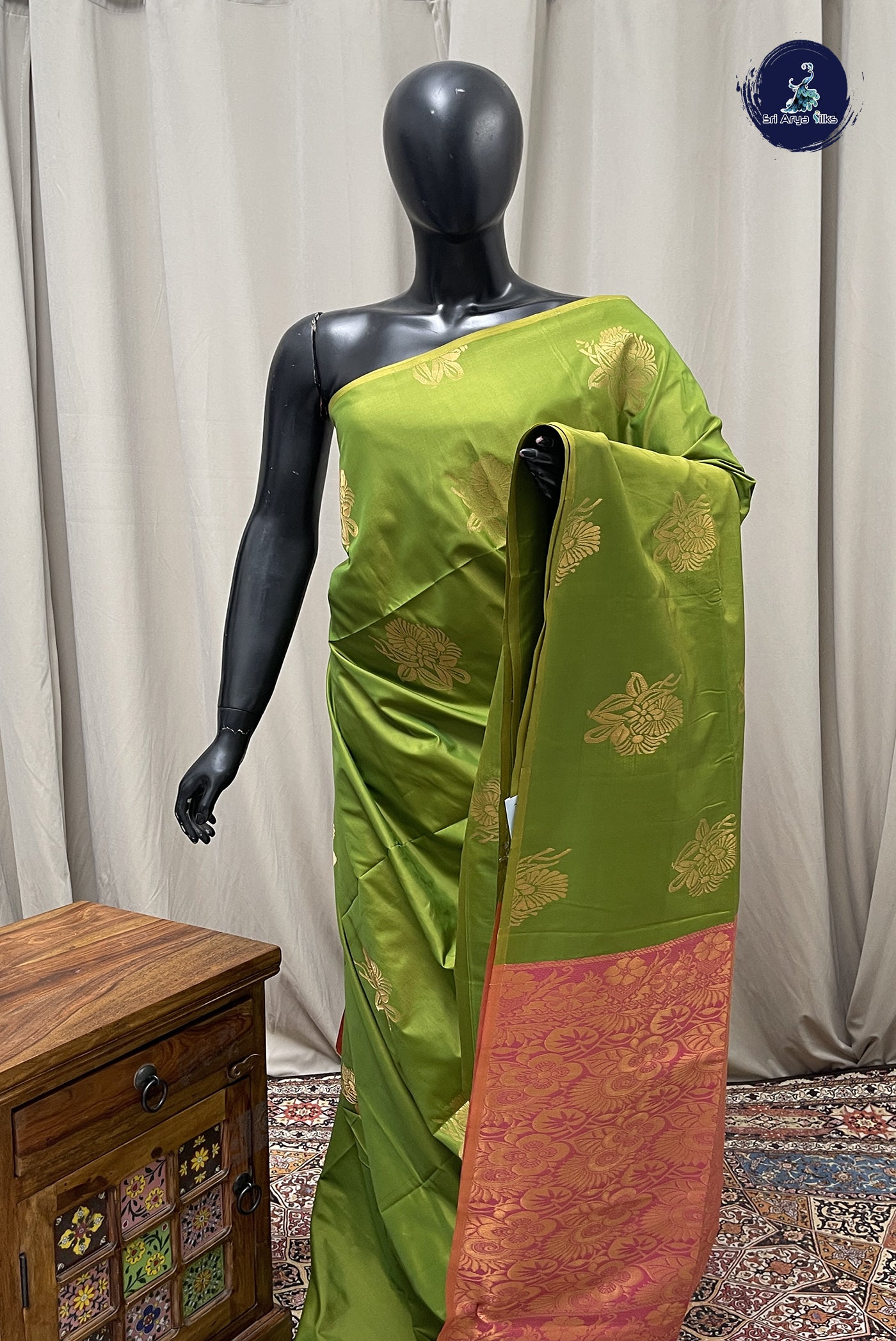 Mehendi Green Semi Soft Silk Saree With Zari Buttas Pattern