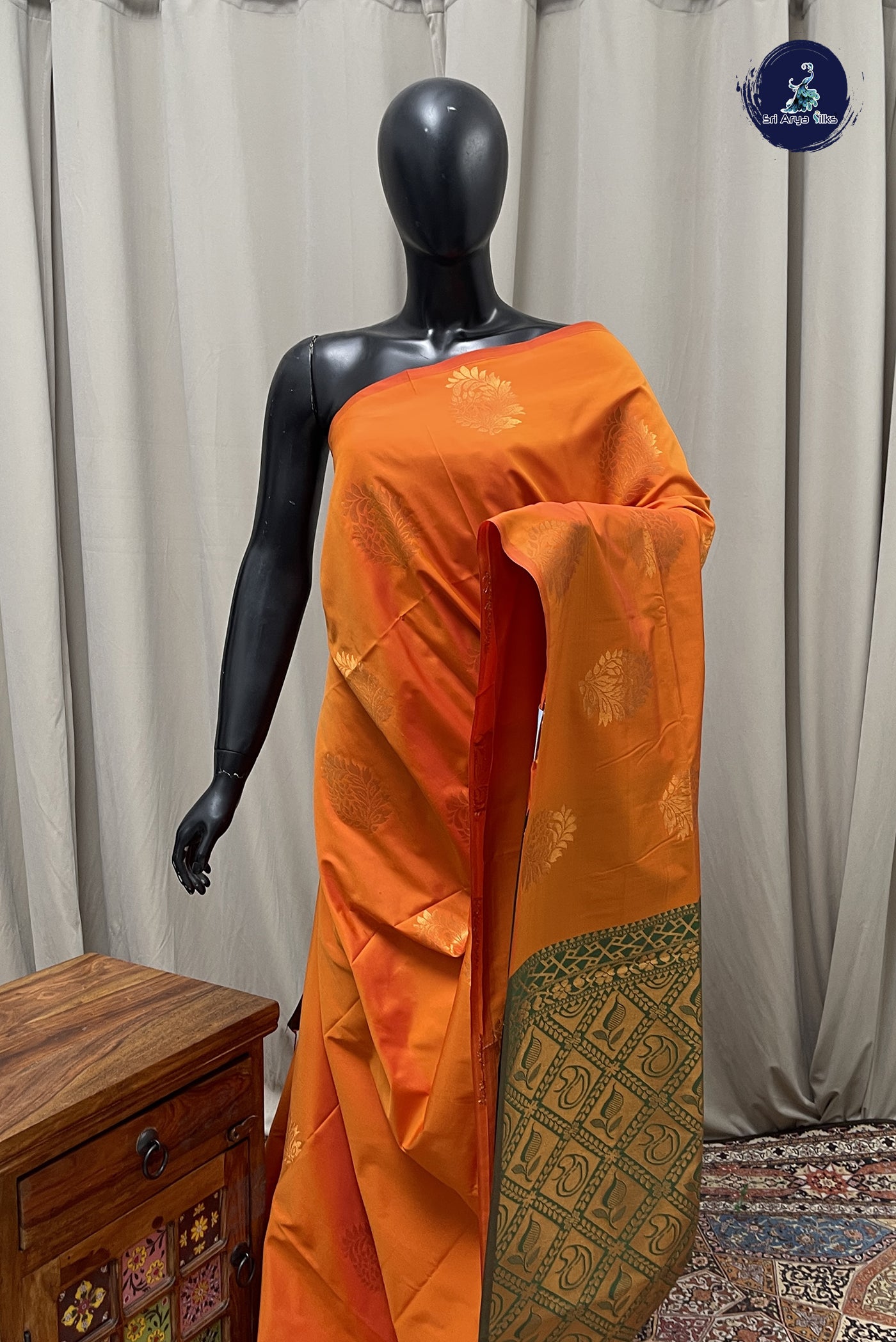 Lite Mustard Orange Semi Soft Silk Saree With Zari Buttas Pattern