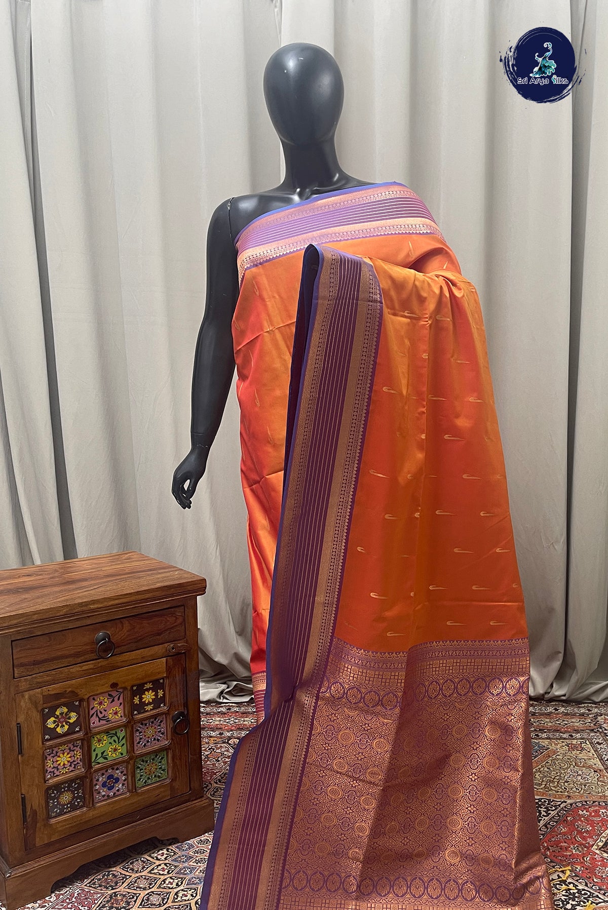 Lite Mustard Orange Semi Silk Saree With Zari Buttas Pattern