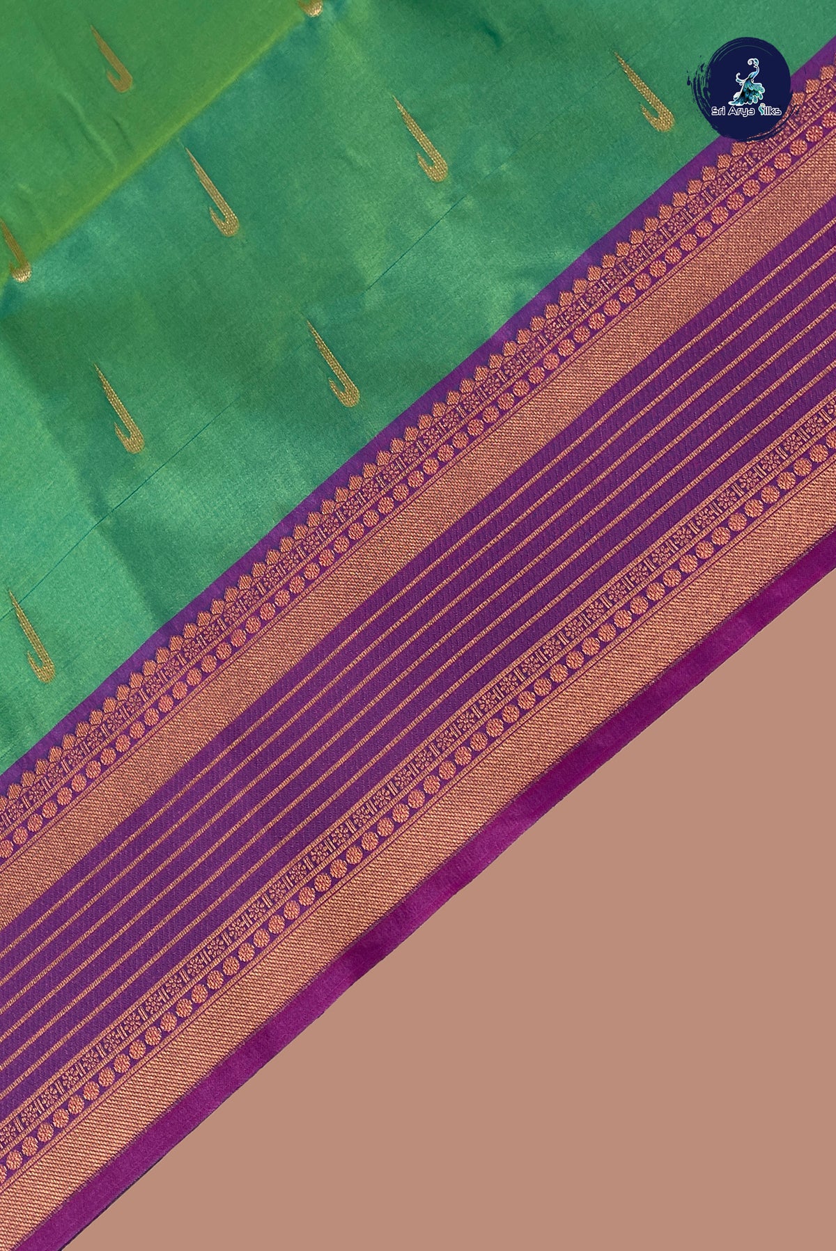 Bluish Green Semi Silk Saree With Zari Buttas Pattern