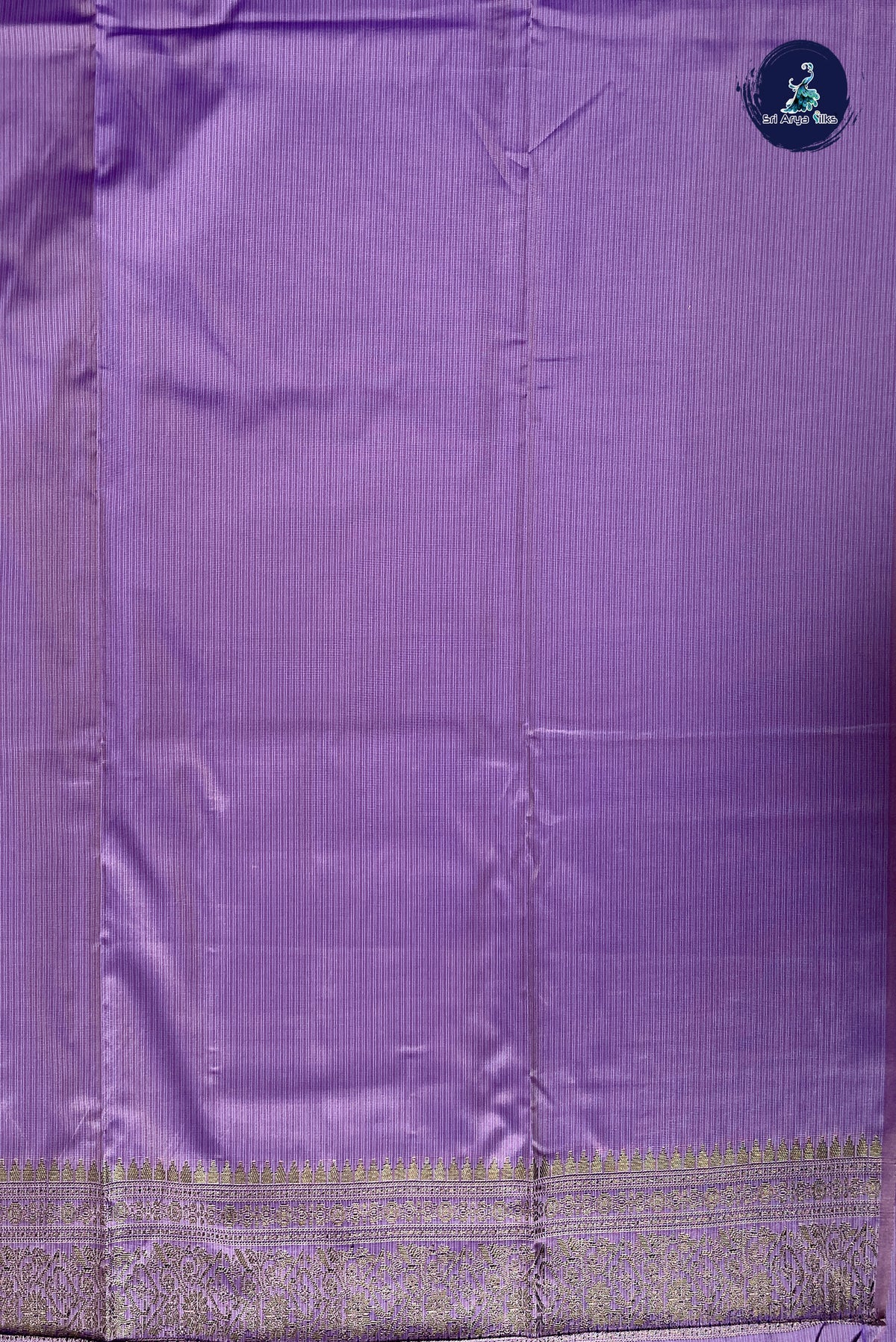Lavender Semi Soft Silk Saree With Zari Buttas Pattern