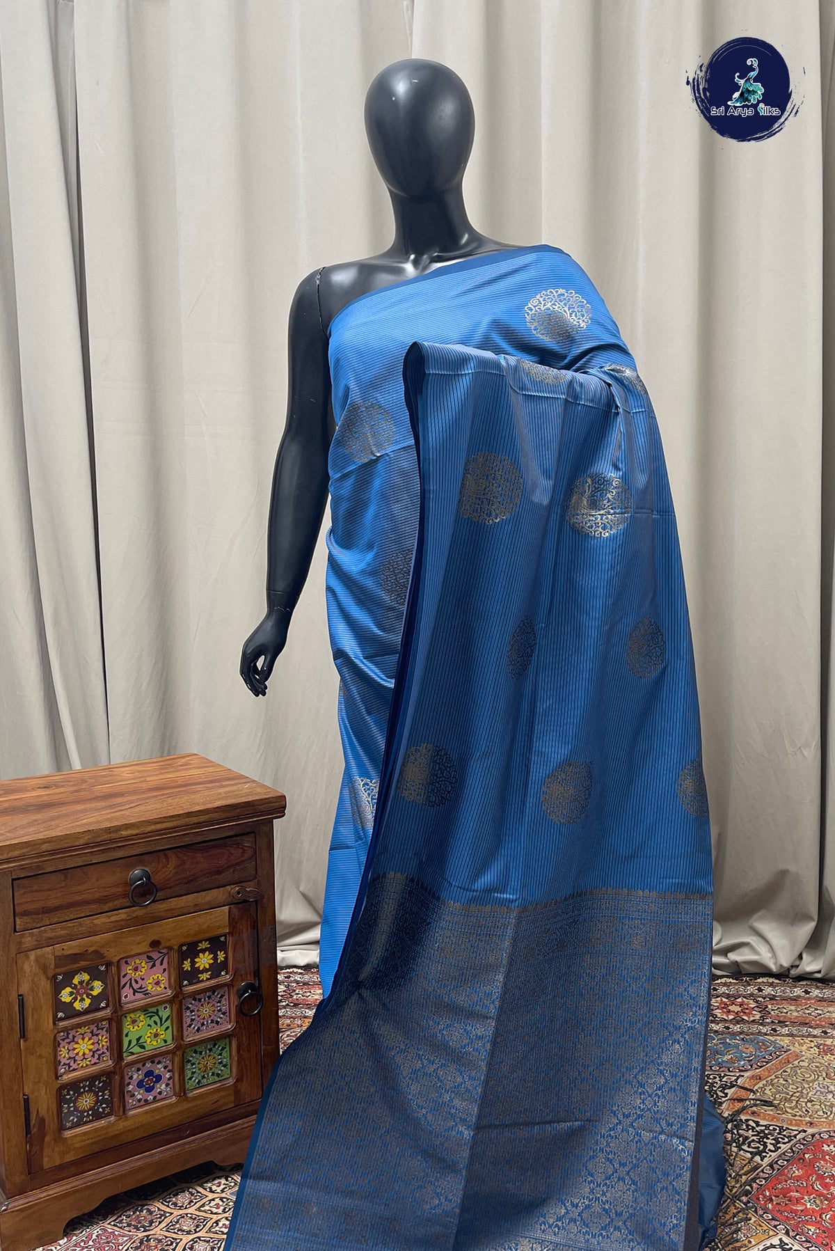 Blue Semi Soft Silk Saree With Zari Buttas Pattern
