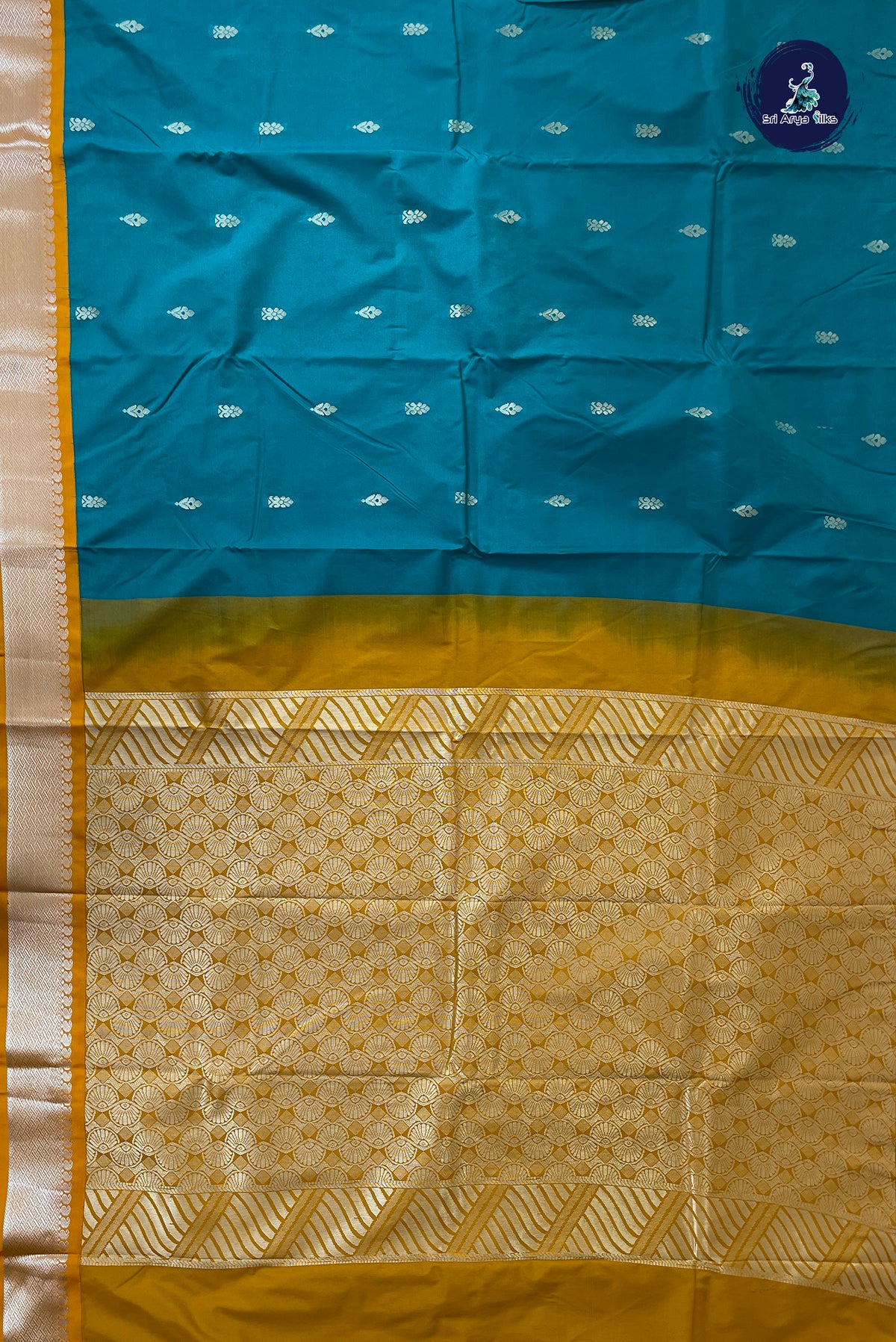 Teal Semi Silk Saree With Zari Buttas Pattern