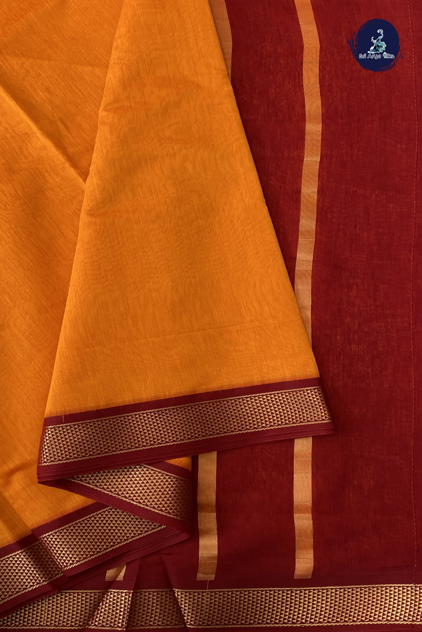 Yellowish Orange Madisar Semi Silk Cotton Saree With Plain Pattern