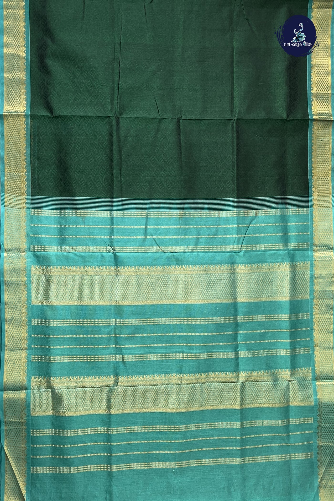 Bottle Green 10 Yards Silk Cotton Saree With Embossed Pattern