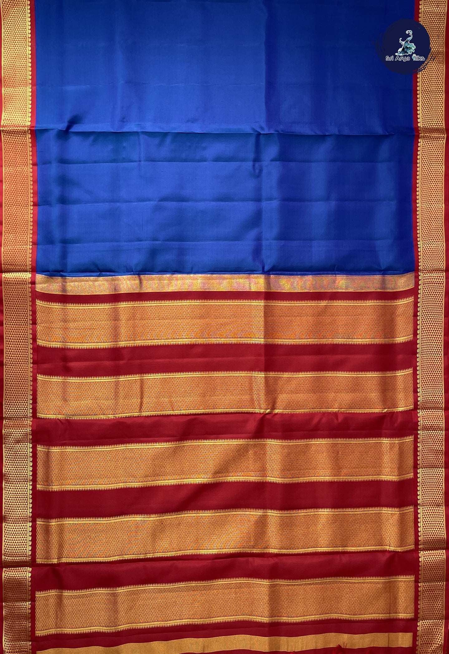 Peacock Blue Madisar 10 Yards Silk Saree With Plain Pattern