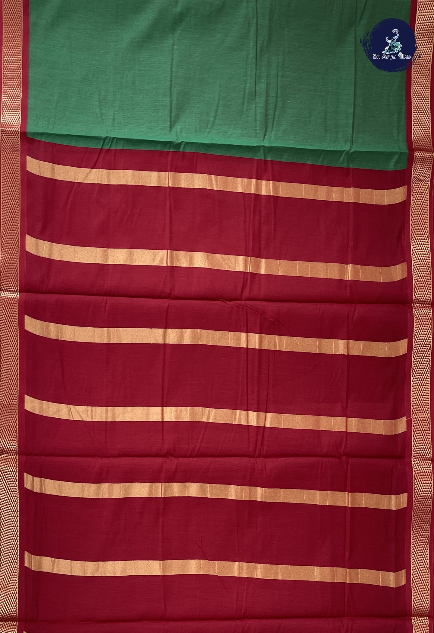 Green Madisar Semi Silk Cotton Saree With Plain Pattern