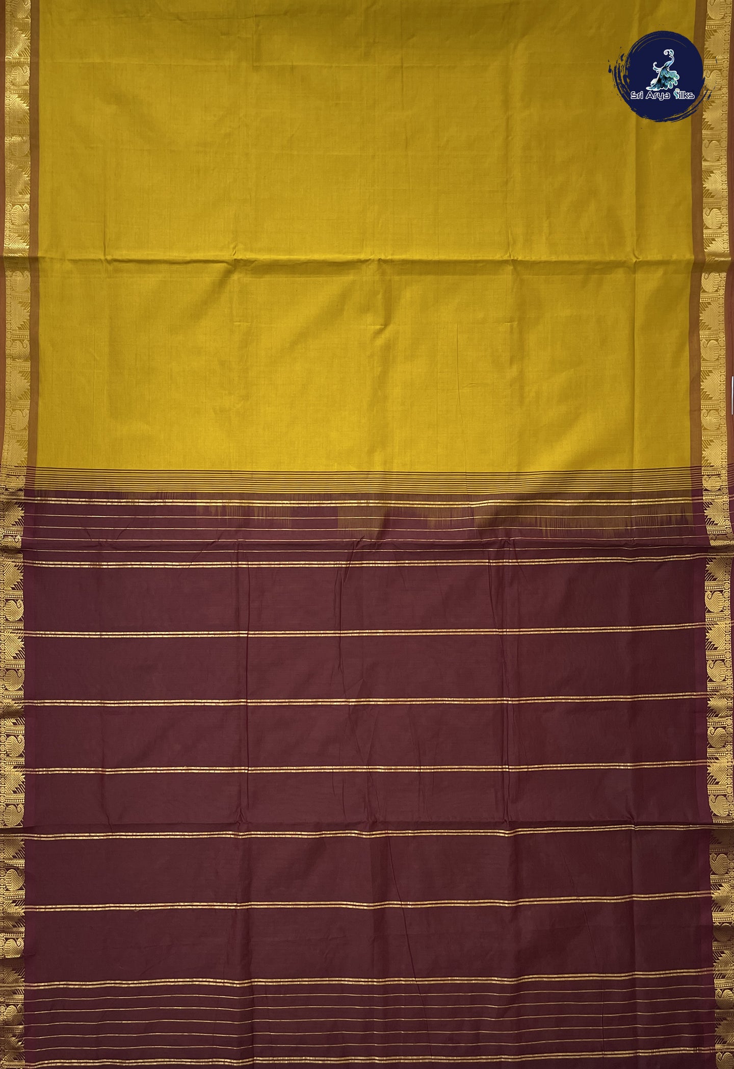 Turmeric Yellow Madisar Semi Silk Cotton Saree With Plain Pattern