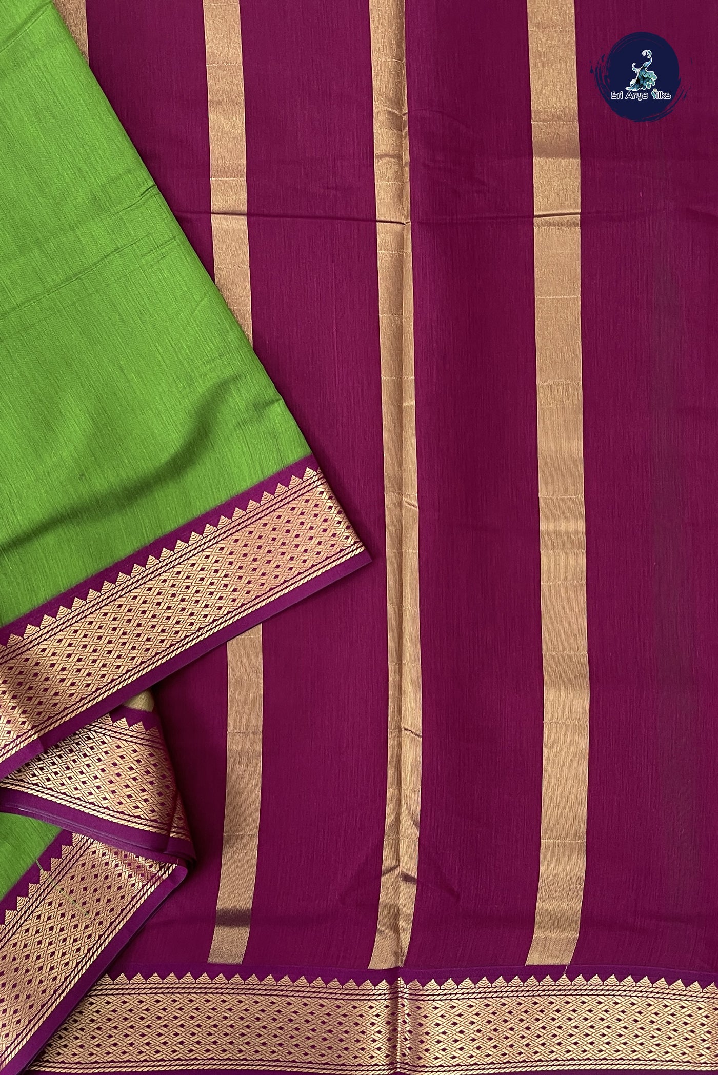 Green Madisar Semi Silk Cotton Saree With Plain Pattern