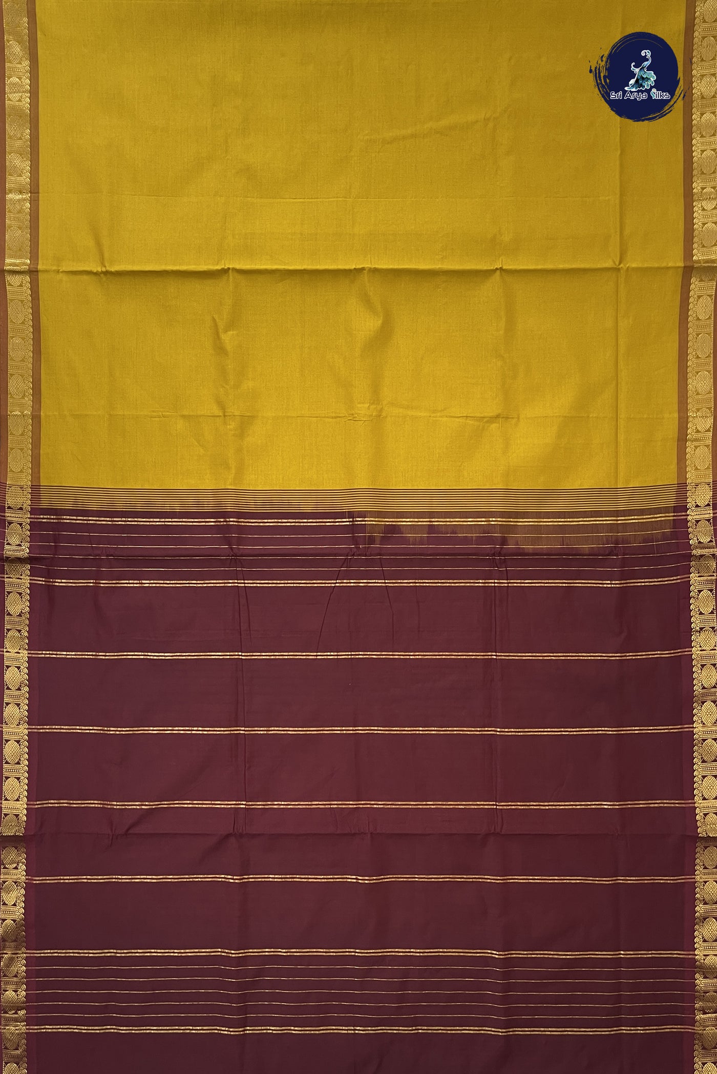 Turmeric Yellow Madisar Semi Silk Cotton Saree With Plain Pattern