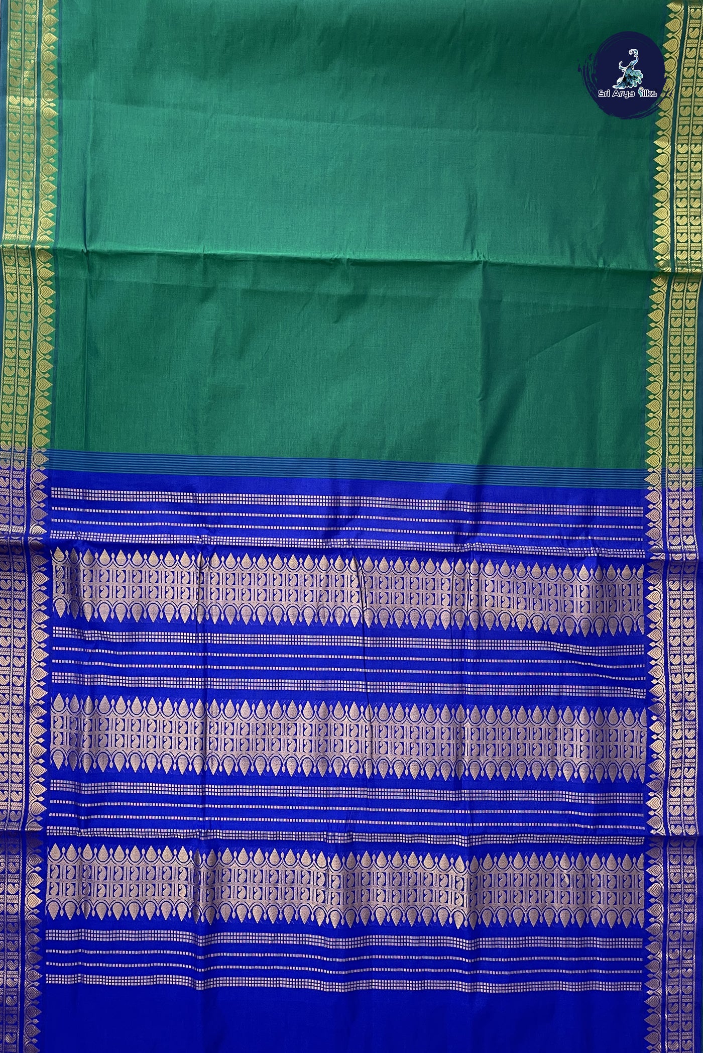 Green Madisar Semi Silk Cotton Saree With Plain Pattern