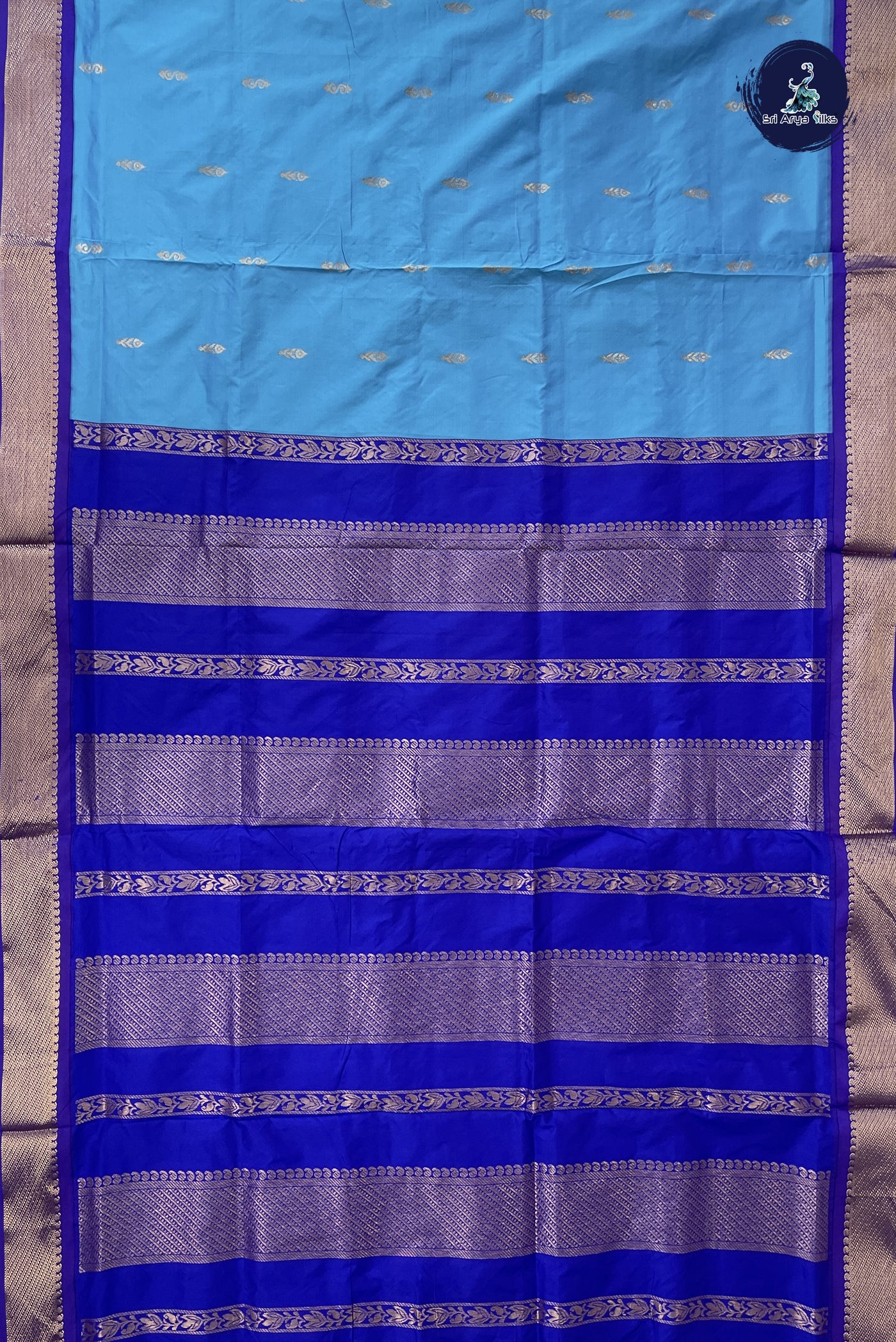 Light Blue Madisar Semi Silk Saree With Zari Buttas Pattern