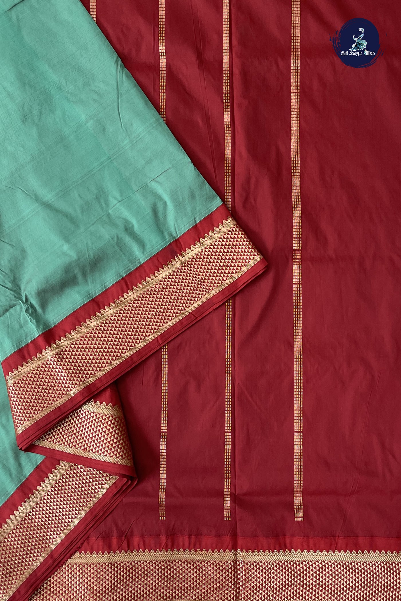Pastel Green Madisar Semi Silk Saree With Plain Pattern