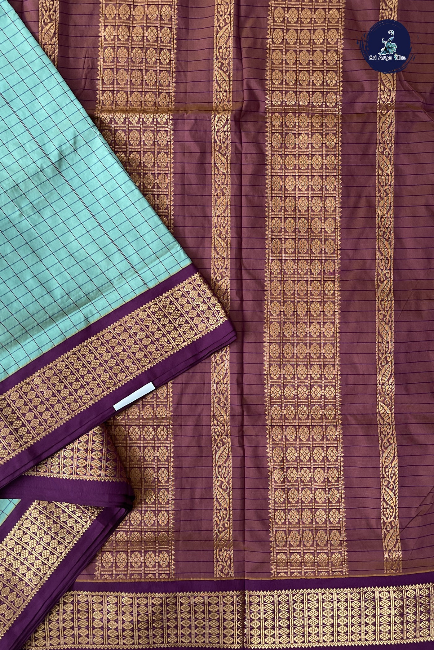 Turquoise Madisar Semi Silk Saree With Checked Pattern