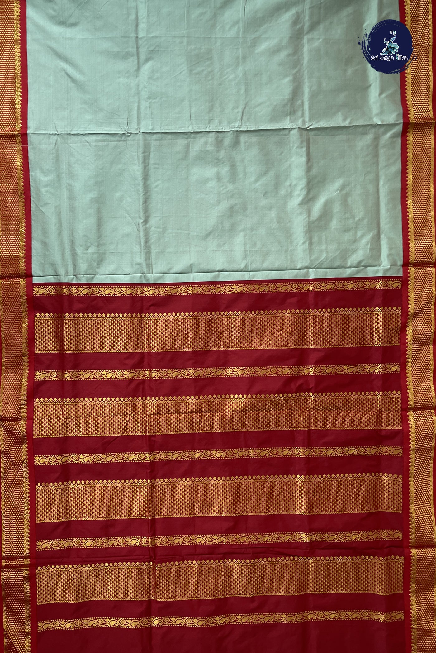Pastel Shade Madisar Semi Silk Saree With Plain Pattern