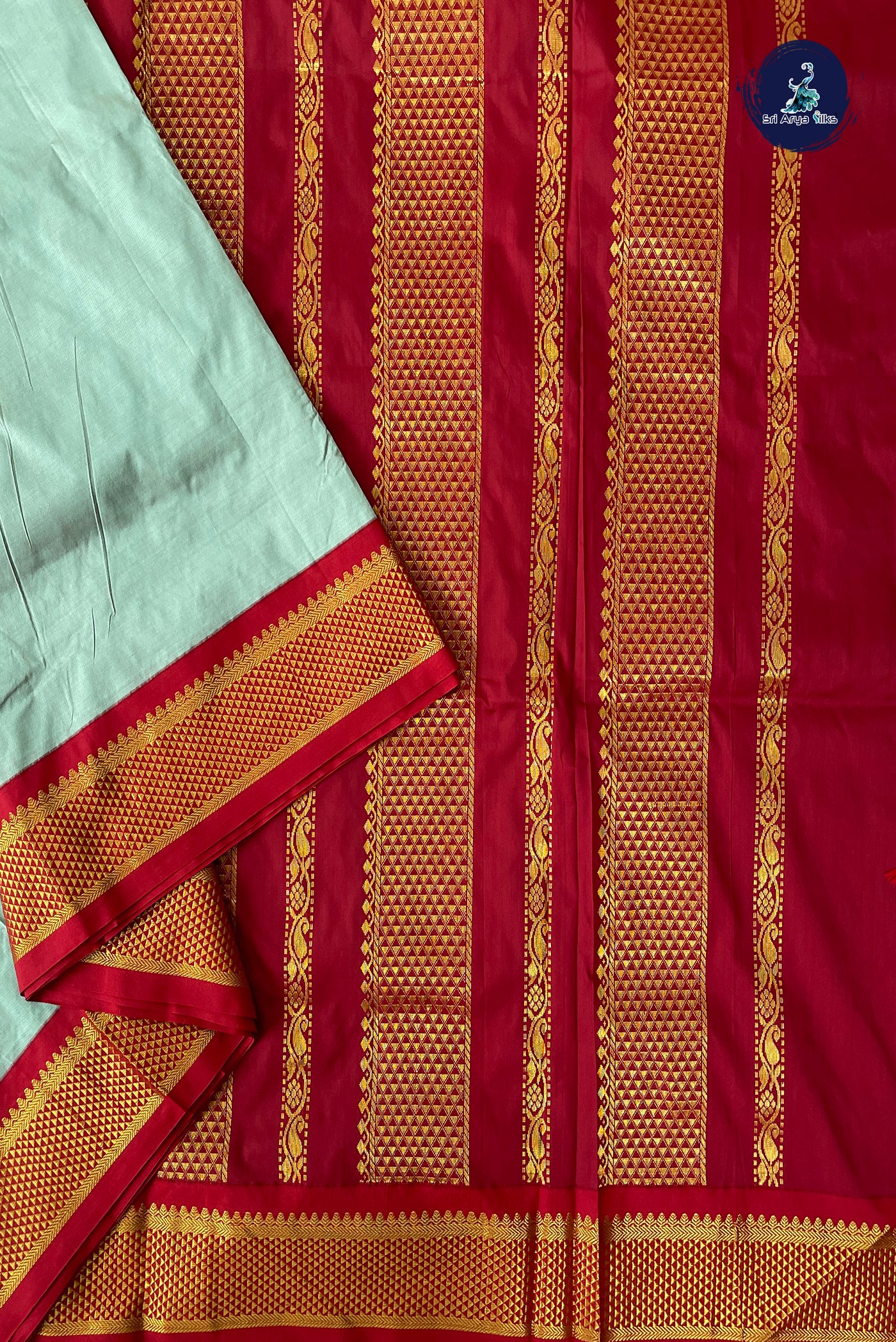 Pastel Green Madisar Semi Silk Saree With Plain Pattern