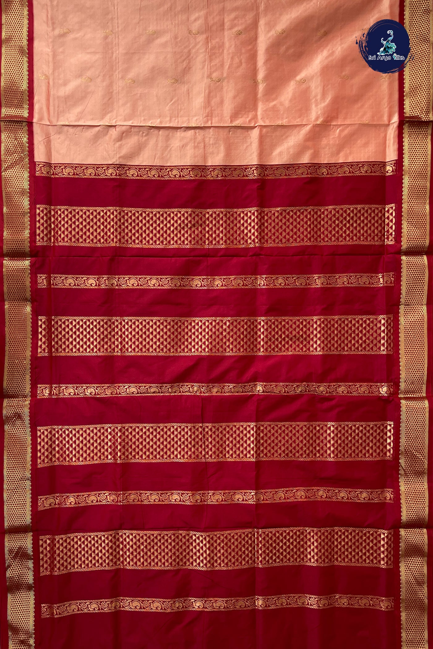 Light Peach Madisar Semi Silk Saree With Zari Buttas Pattern