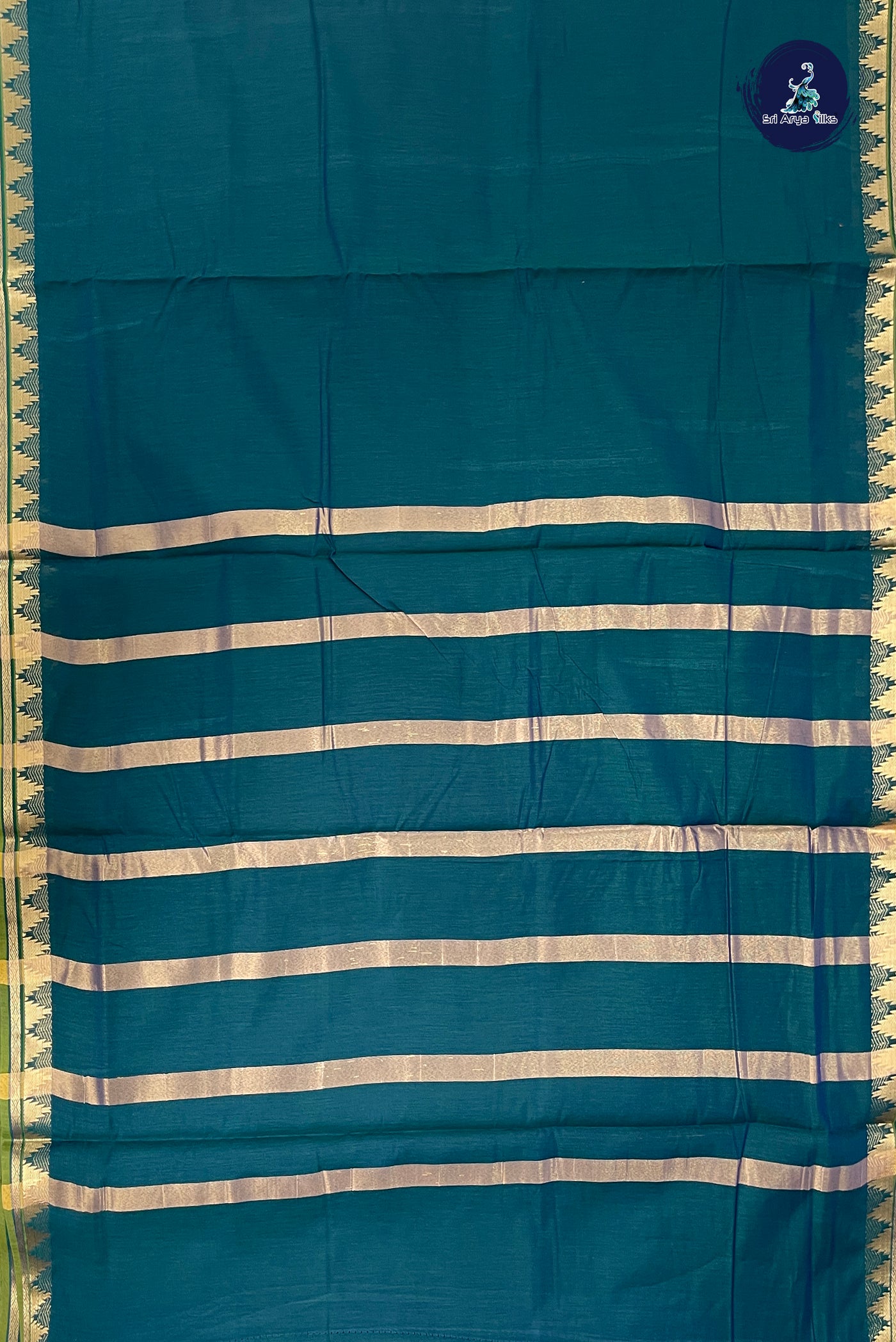 Green Madisar Semi Silk Cotton Saree With Plain Pattern