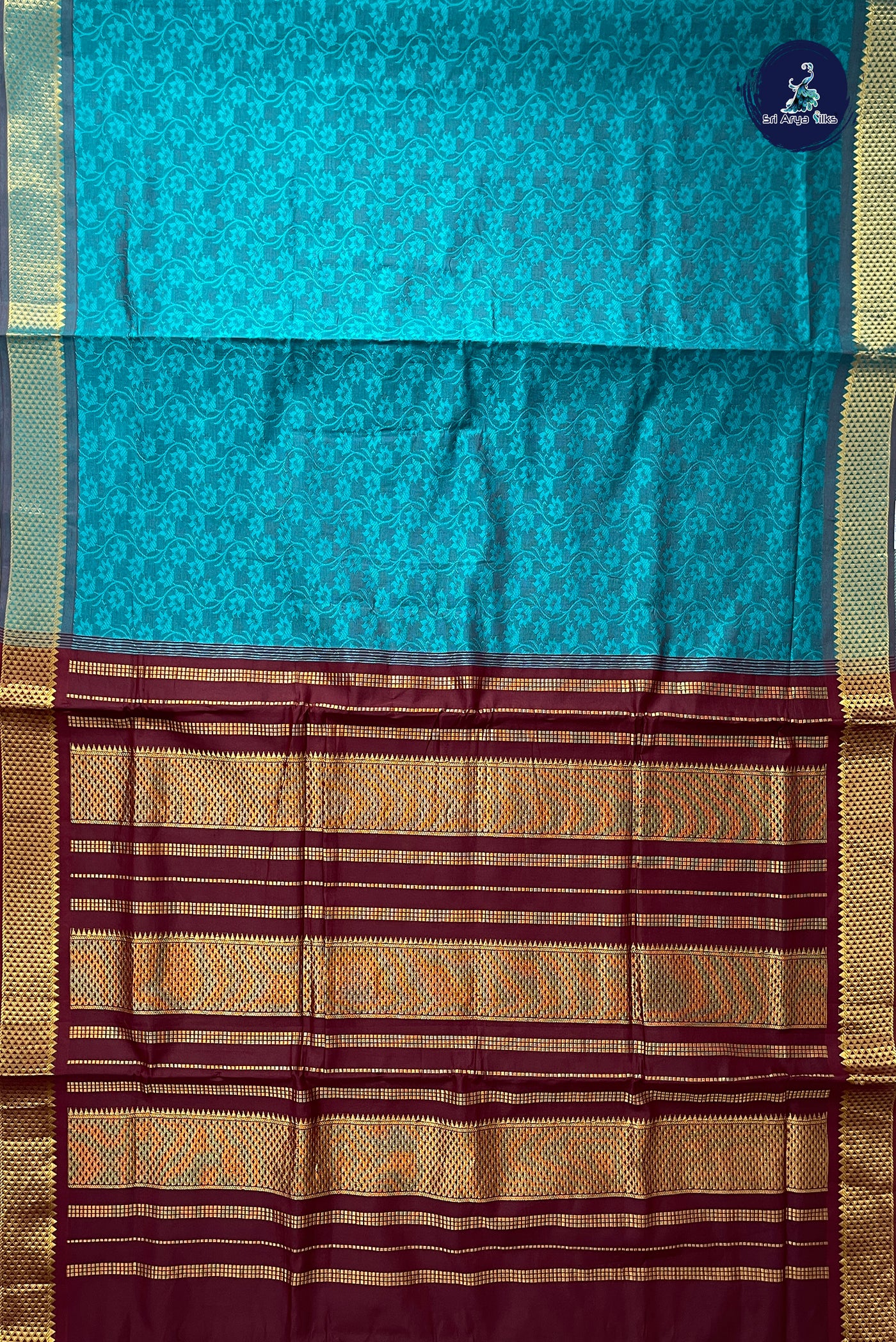 Teal Half Pure Madisar Silk Cotton Saree With Embossed Pattern