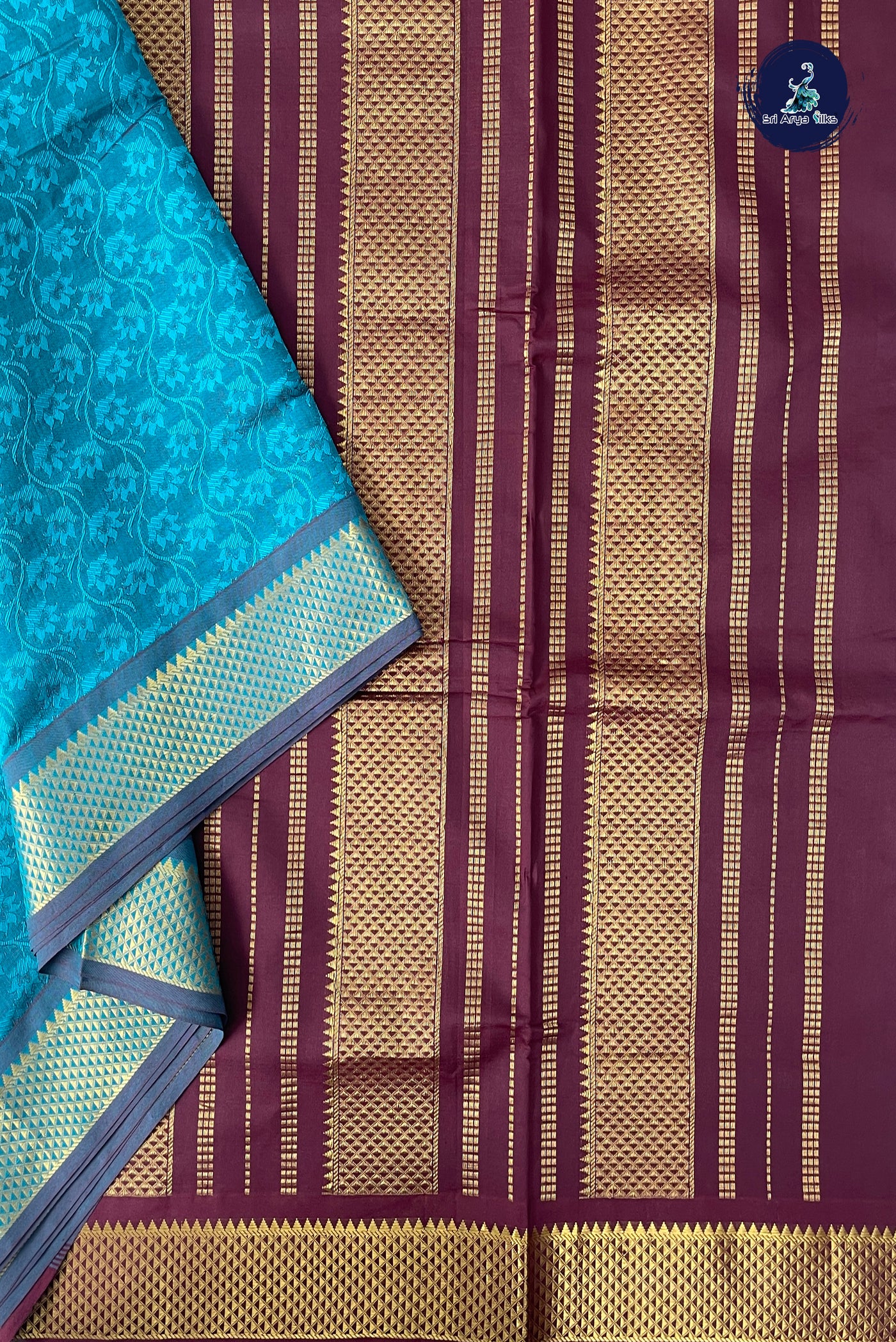 Teal Half Pure Madisar Silk Cotton Saree With Embossed Pattern