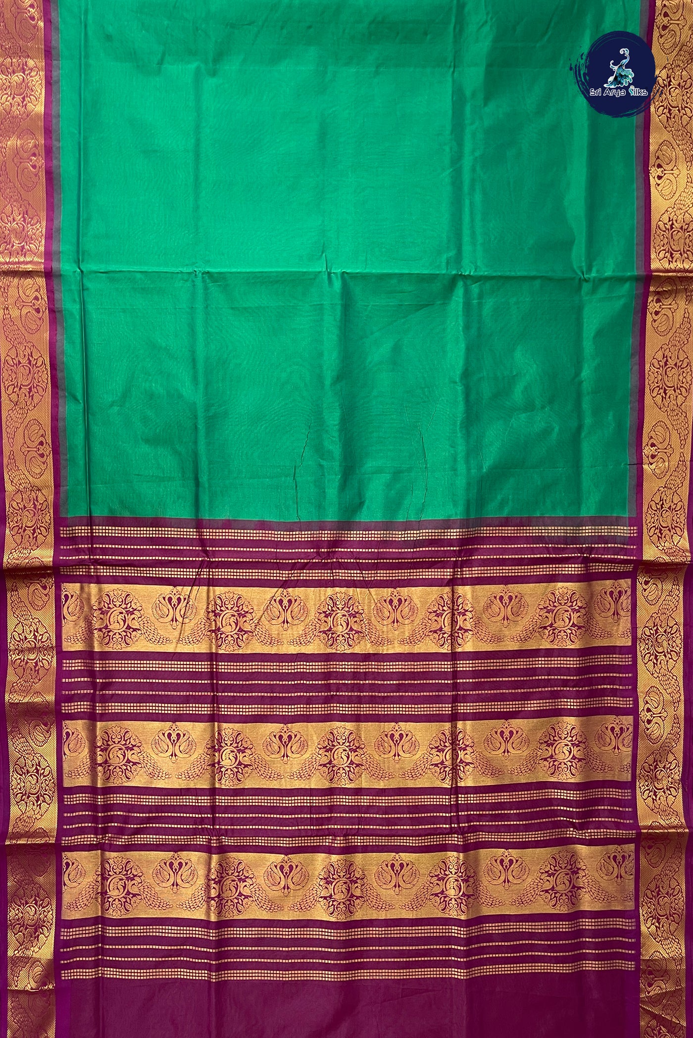 Green Half Pure Madisar Silk Cotton Saree With Plain Pattern