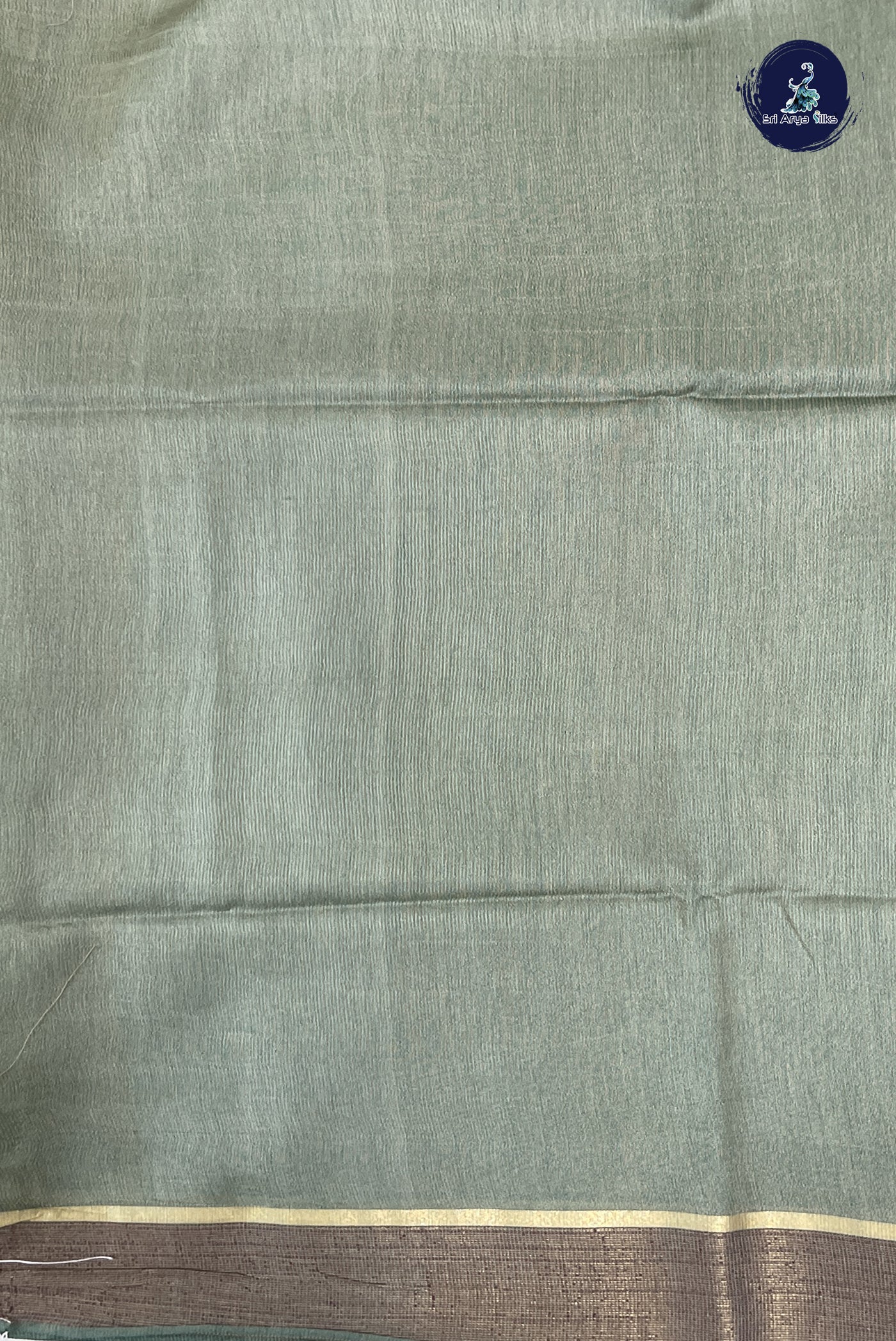 Teal Blue Tussar Saree With Zari Woven Pattern