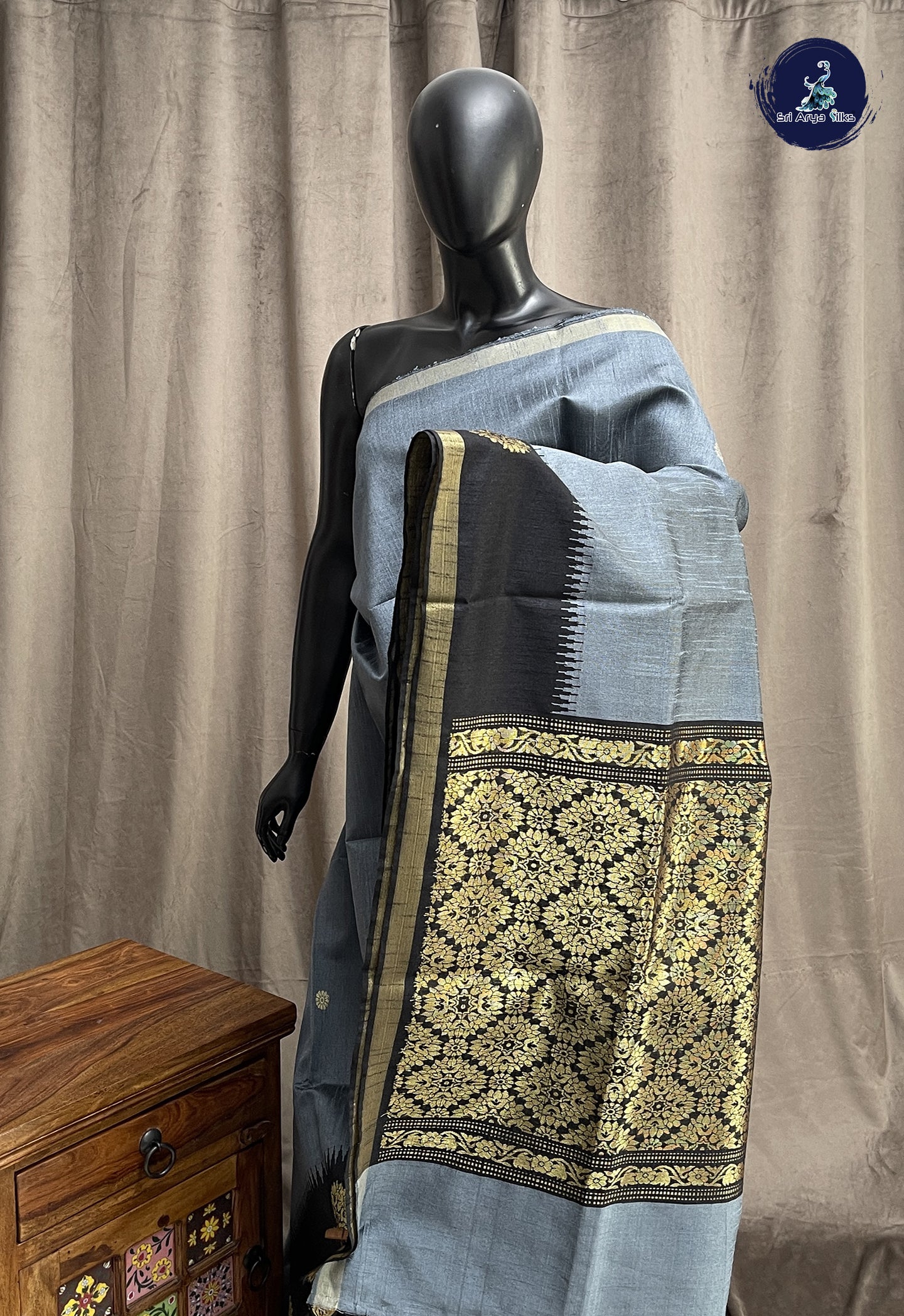 Grey Raw Silk Saree With Zari Buttas Pattern