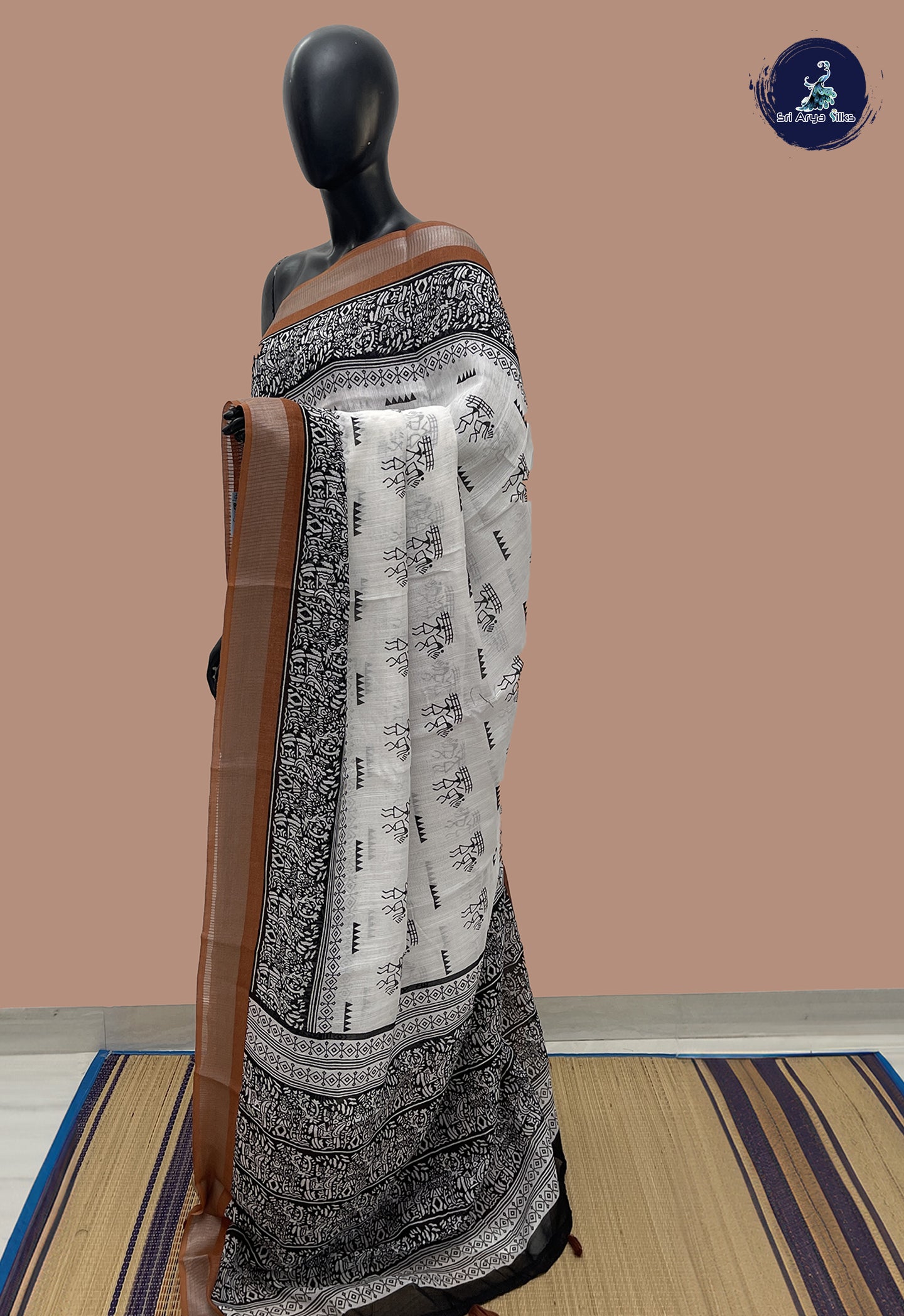 White Linen Saree With Printed Pattern