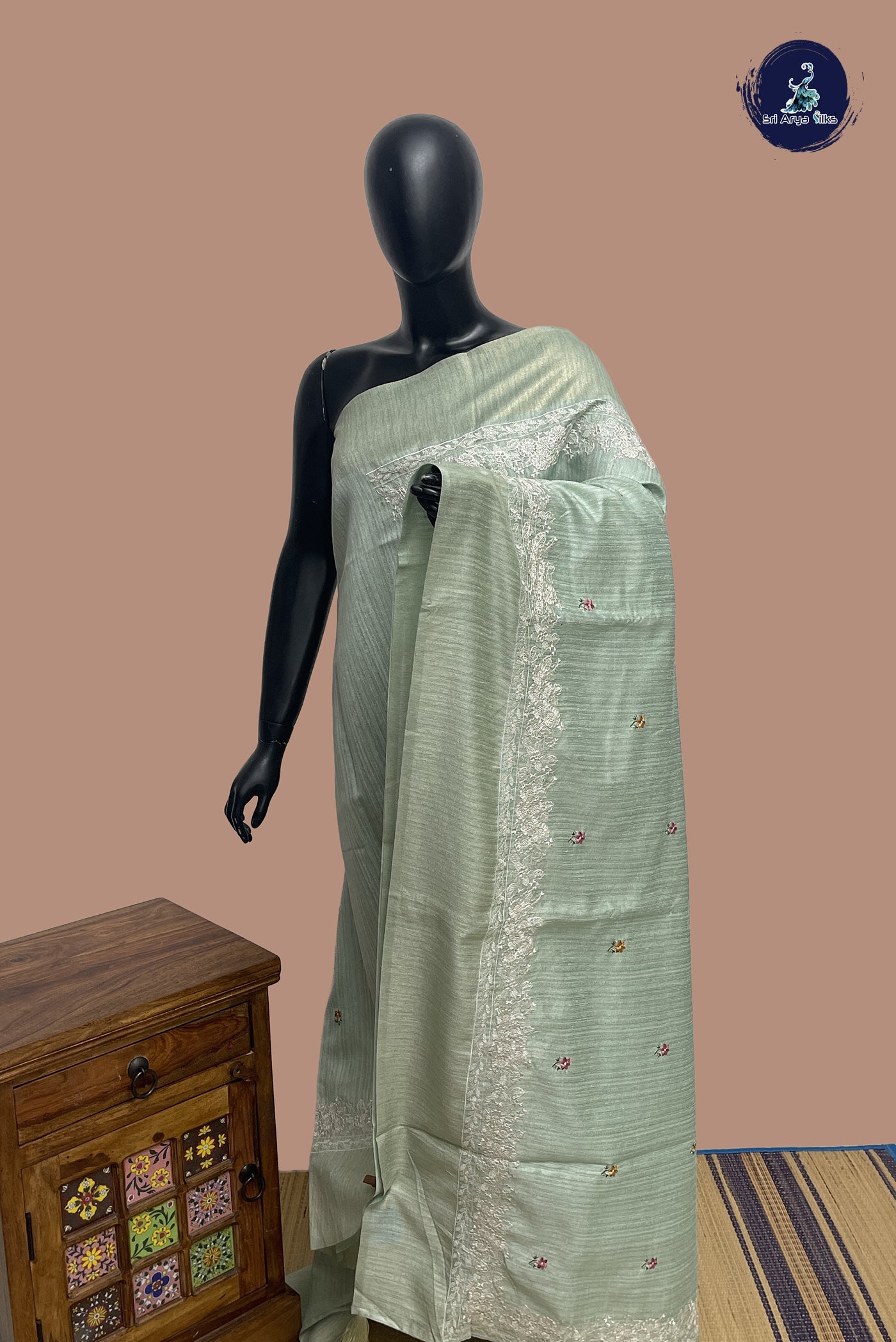 Pastel Green Linen Saree With Thread Work Pattern