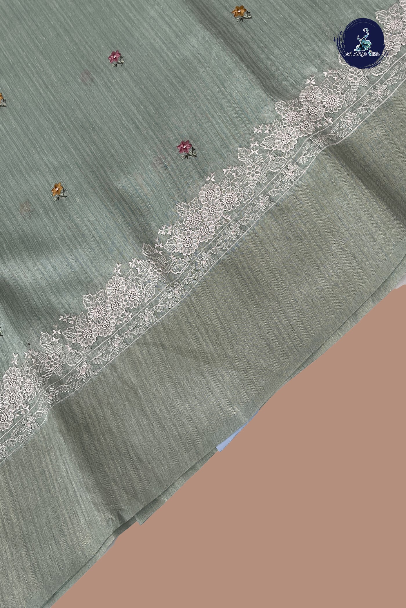 Pastel Green Linen Saree With Thread Work Pattern