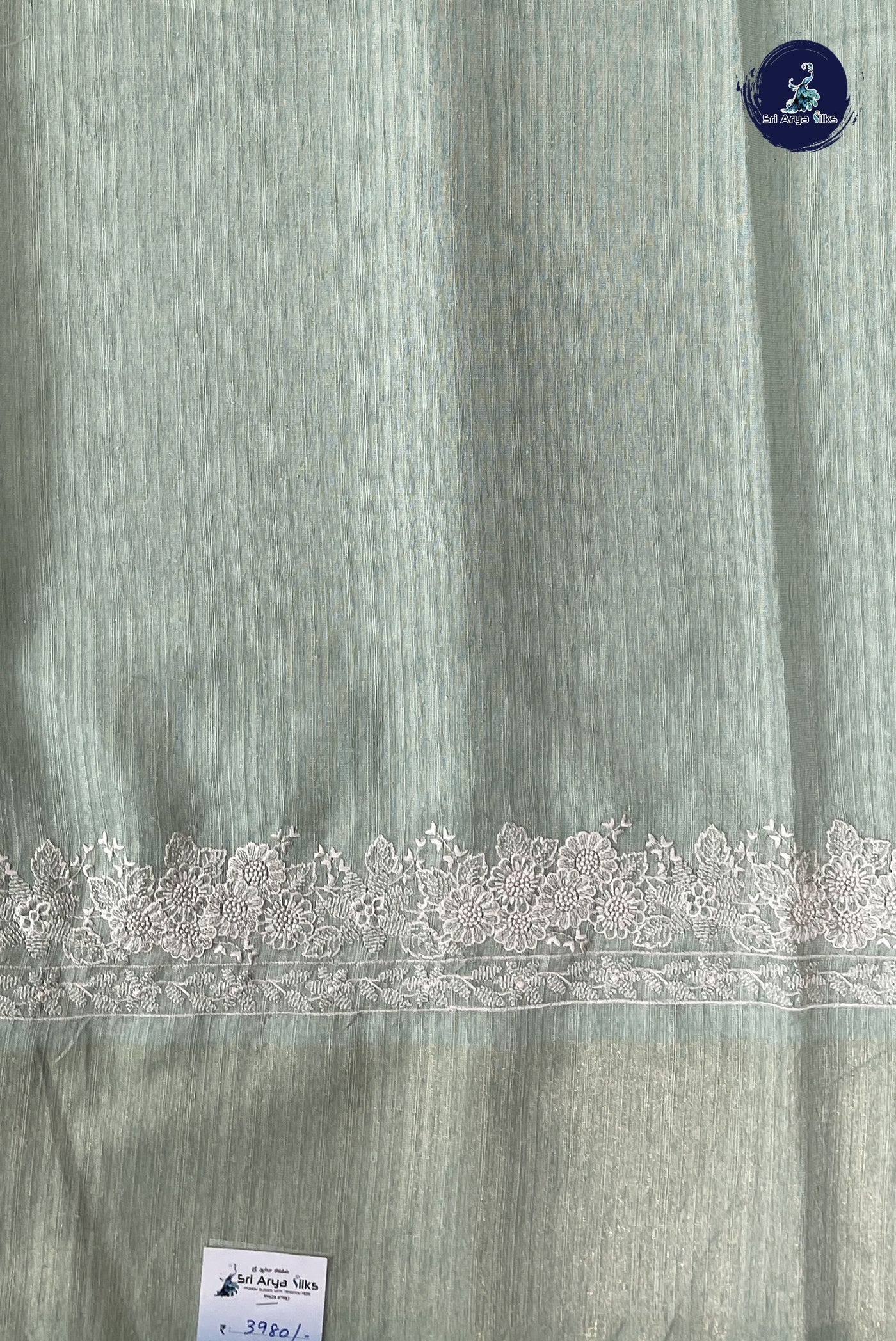 Pastel Green Linen Saree With Thread Work Pattern