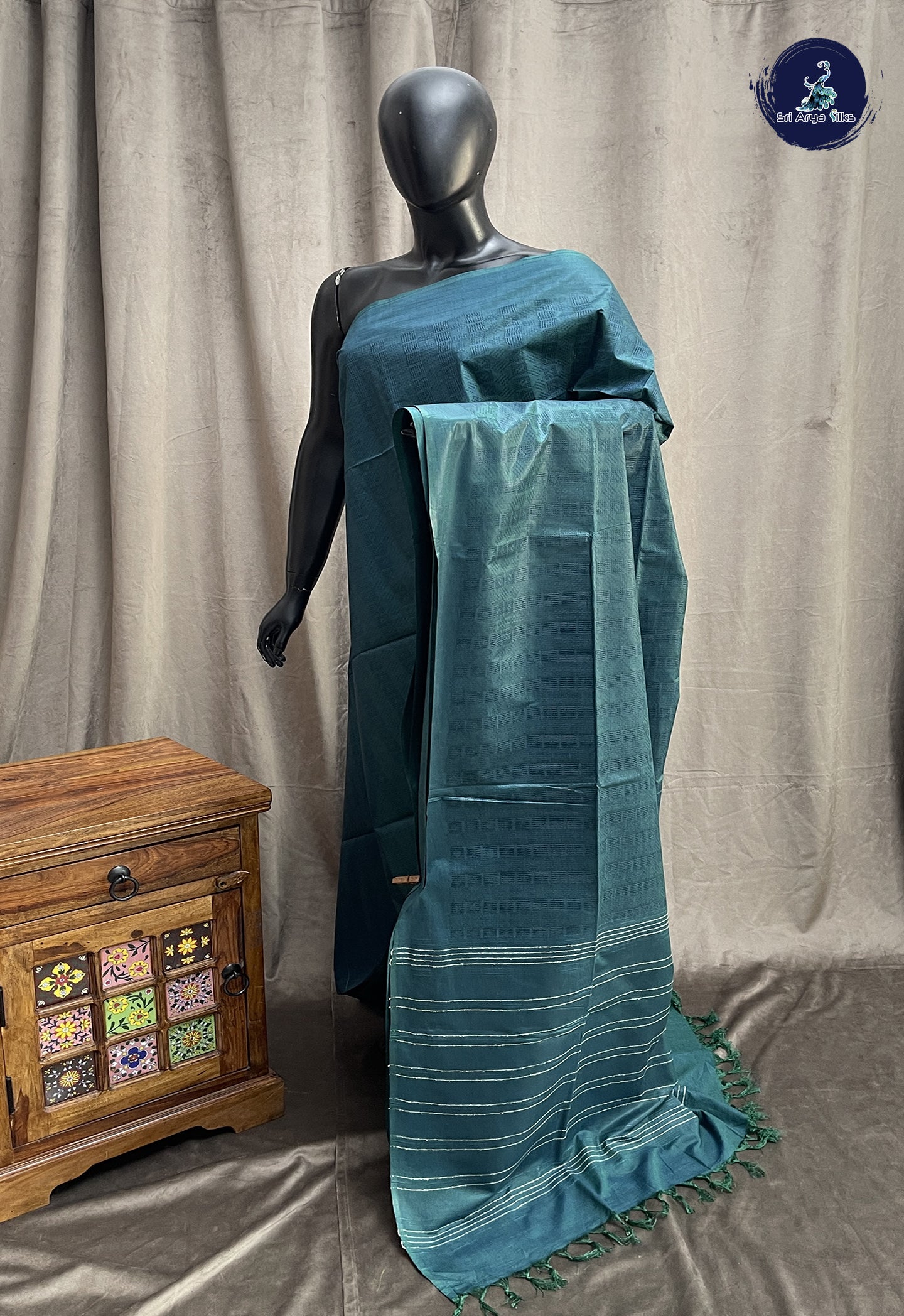 Teal Blue Tussar Saree With Embossed Pattern