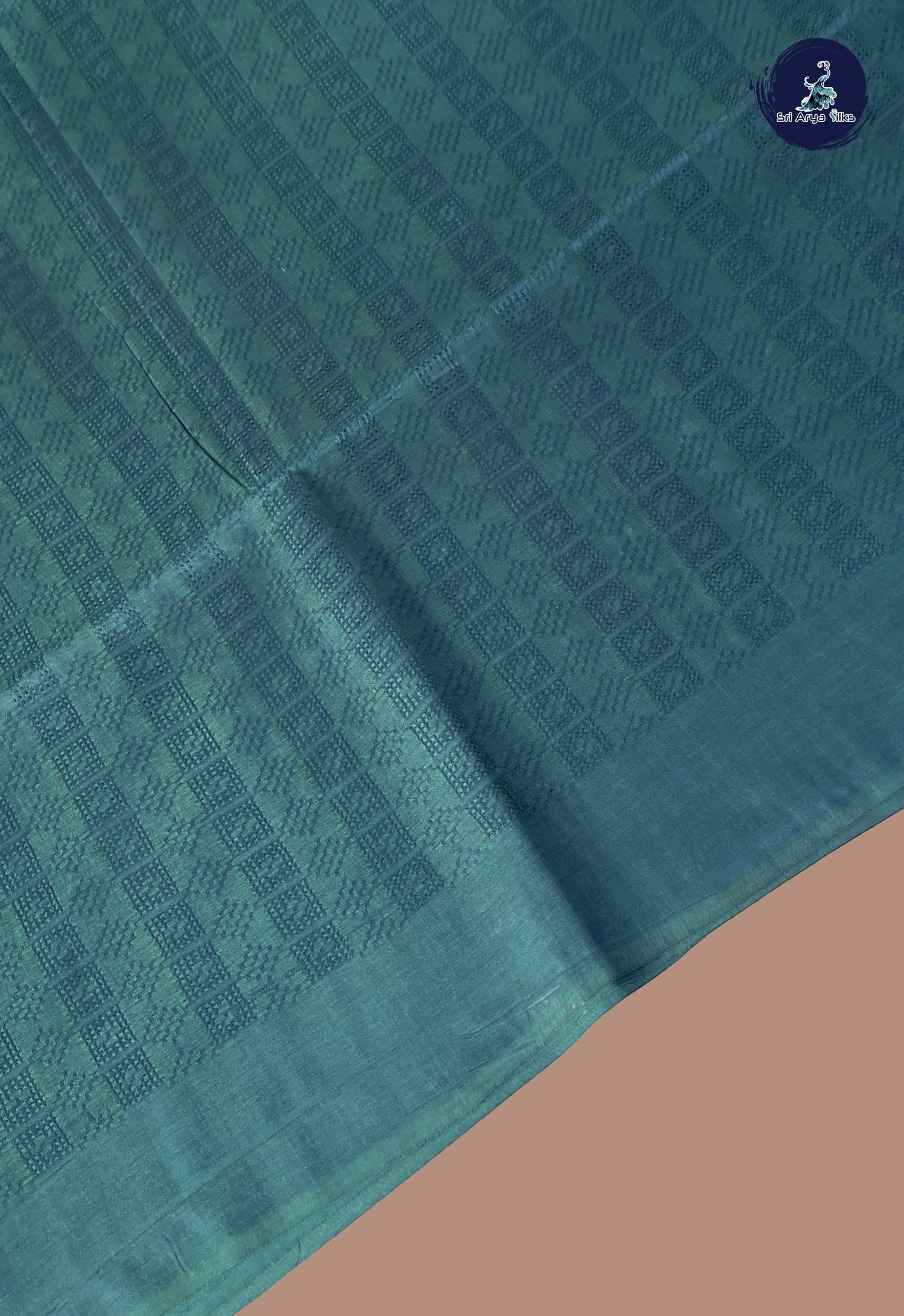 Teal Blue Tussar Saree With Embossed Pattern