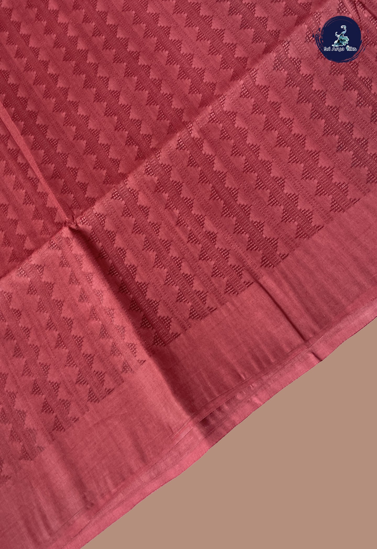 Light Burgundy Tussar Saree With Embossed Pattern