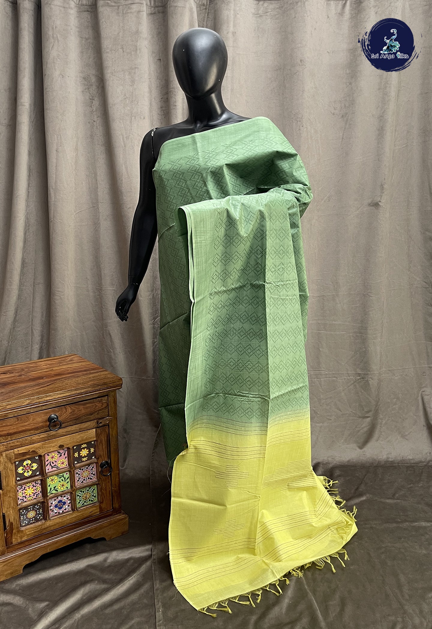 Green Tussar Saree With Embossed Pattern