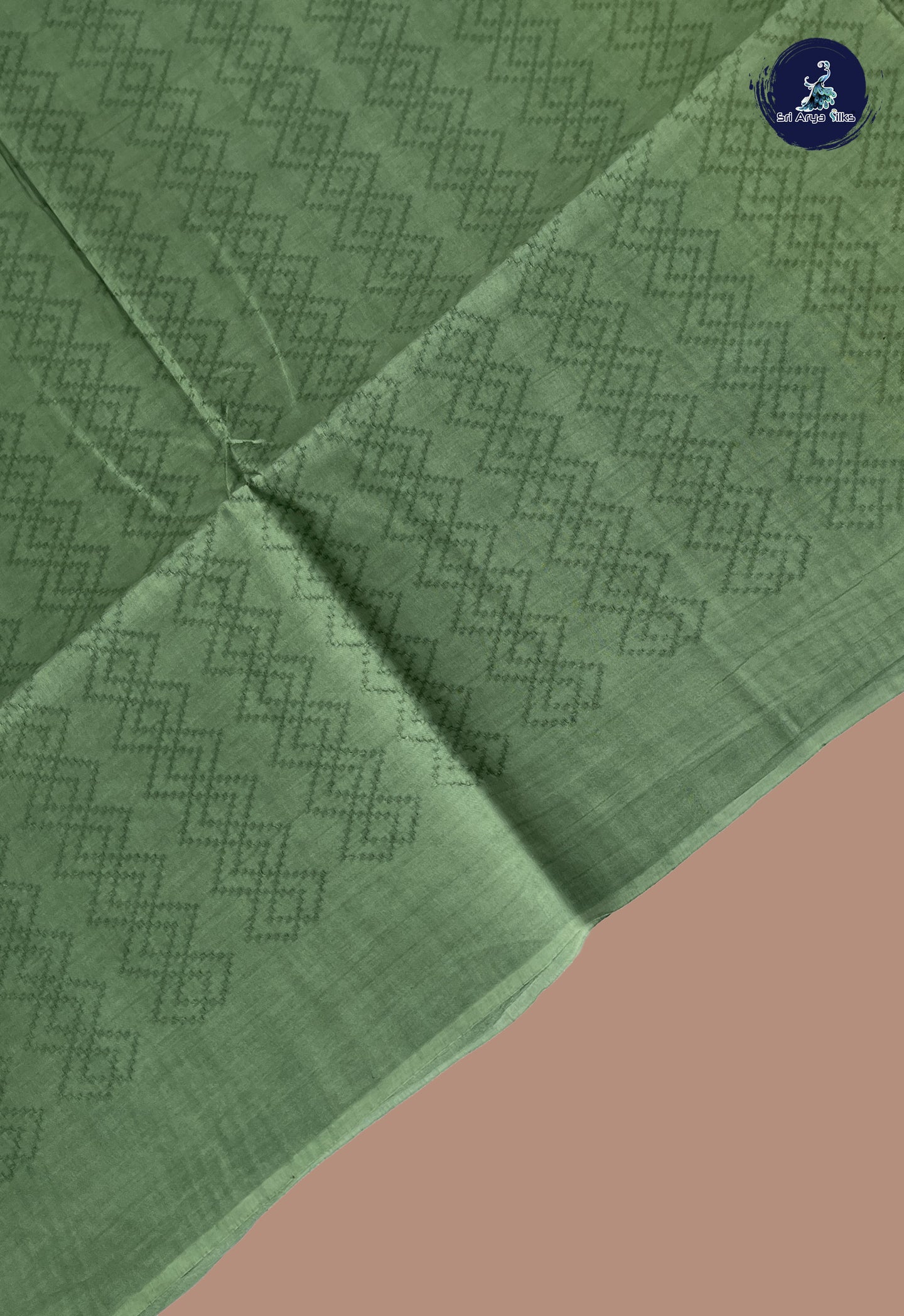 Green Tussar Saree With Embossed Pattern