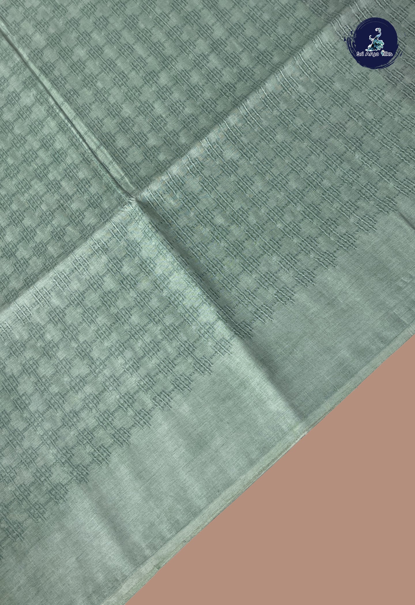 Powder Blue Tussar Saree With Embossed Pattern