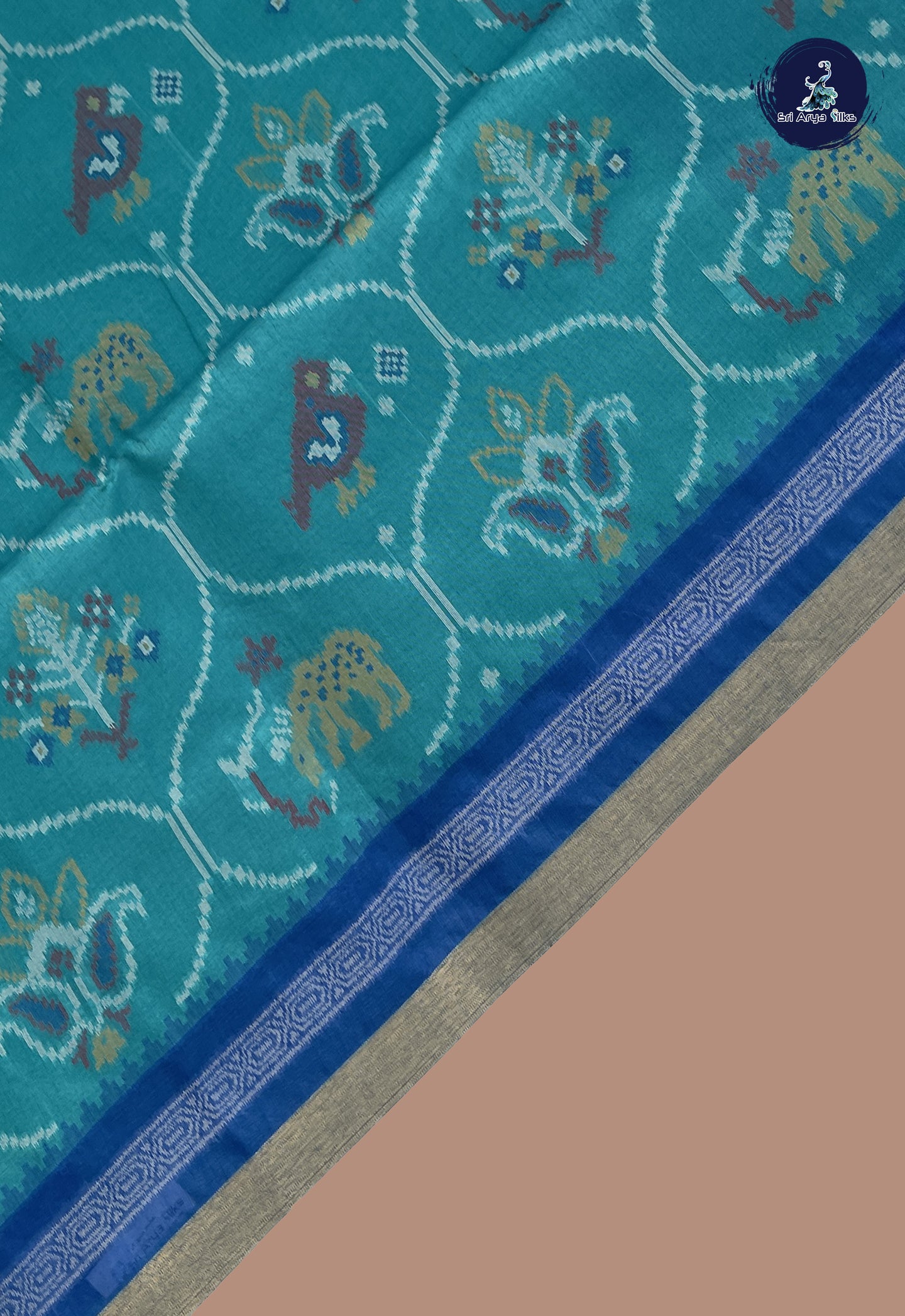 Teal Semi Raw Silk Saree With Ikat Pattern
