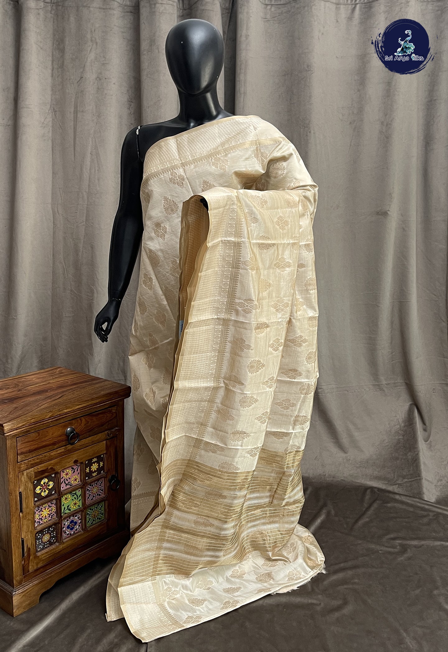 Off White Semi Tussar Saree With Zari Buttas Pattern