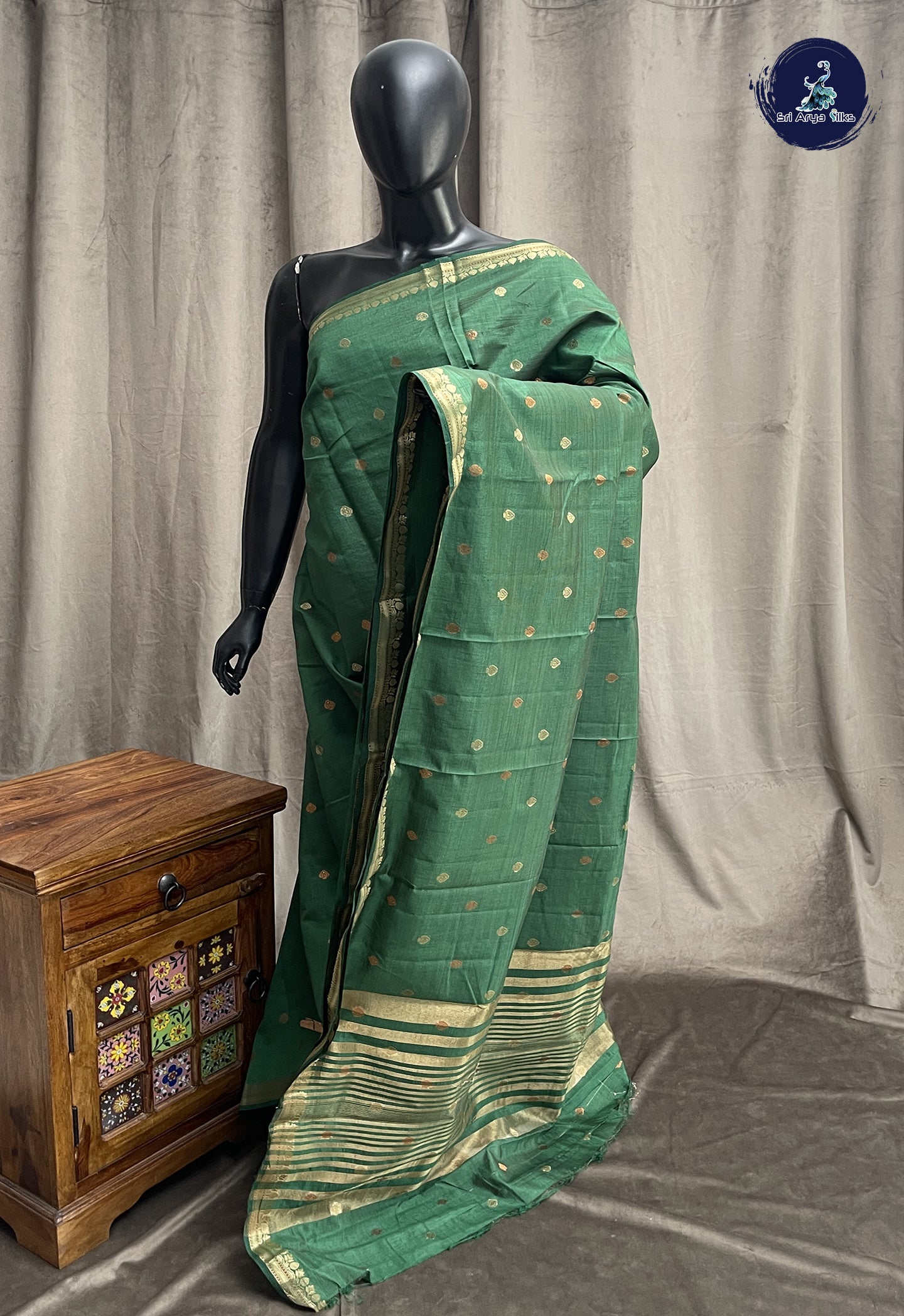 Dark Green Semi Tussar Saree With Zari Buttas Pattern