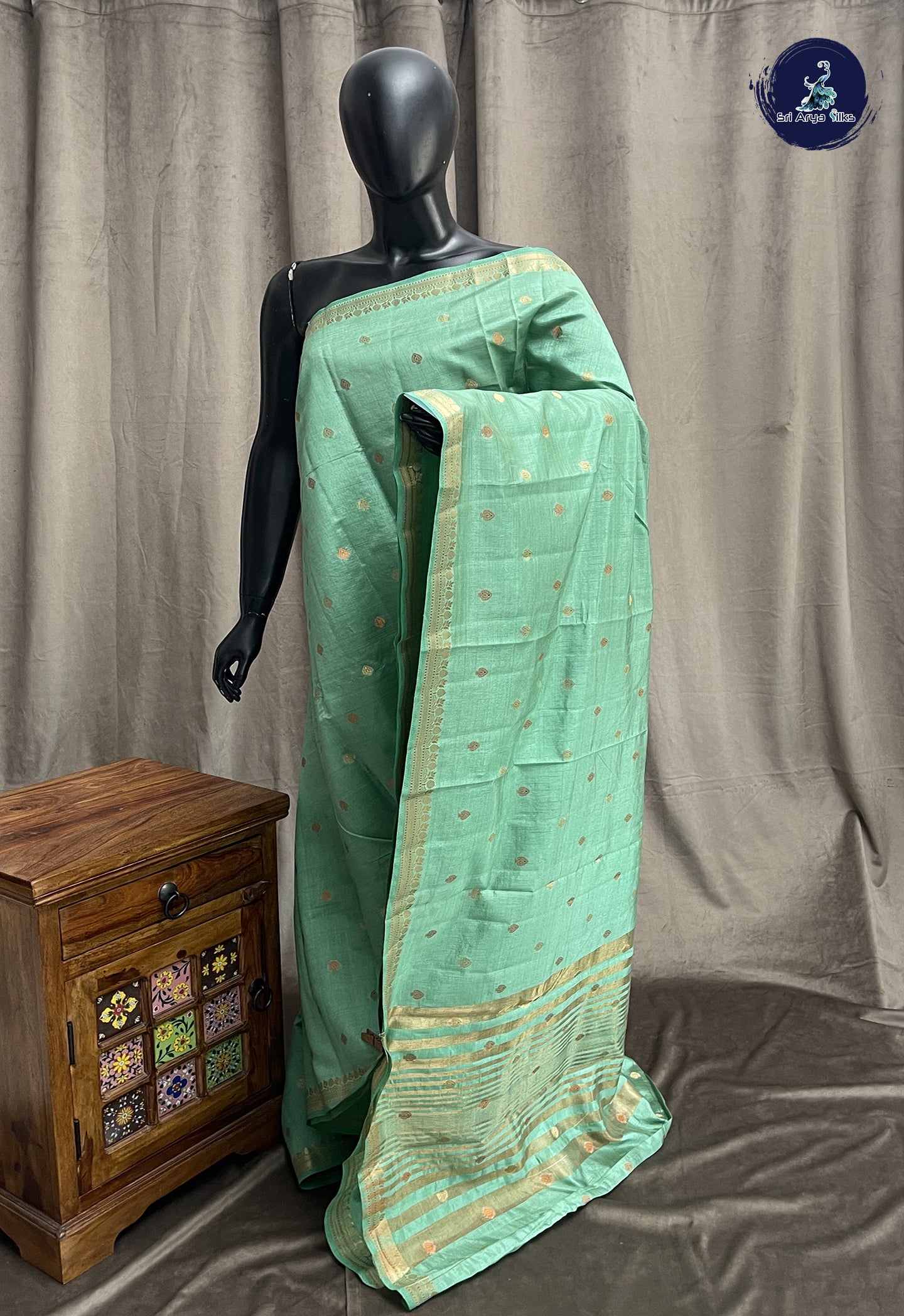 Pastel Green Semi Tussar Saree With Zari Buttas Pattern