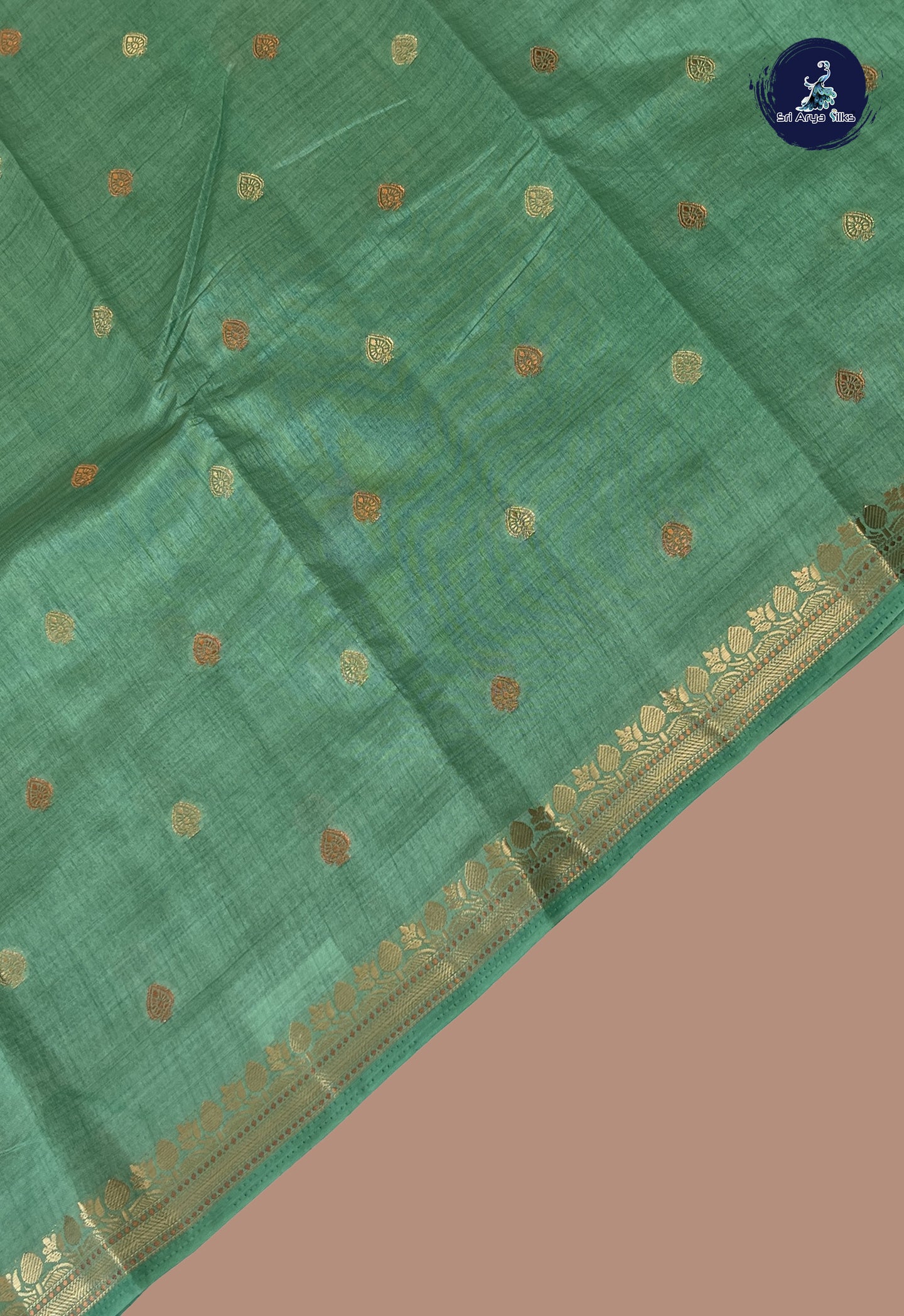 Pastel Green Semi Tussar Saree With Zari Buttas Pattern