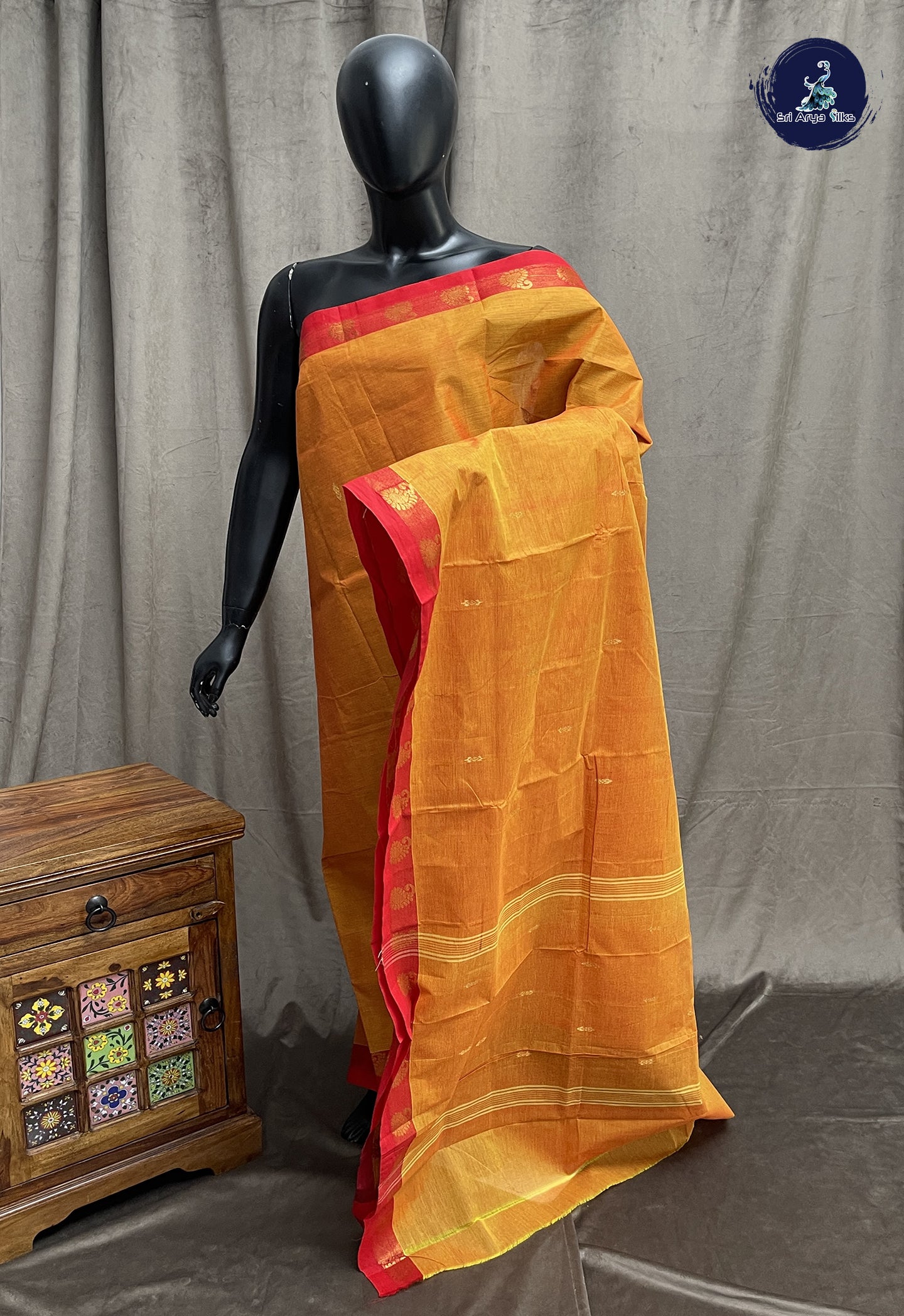 Lite Mustard Orange Chettinad Cotton Saree With Zari Buttas Pattern