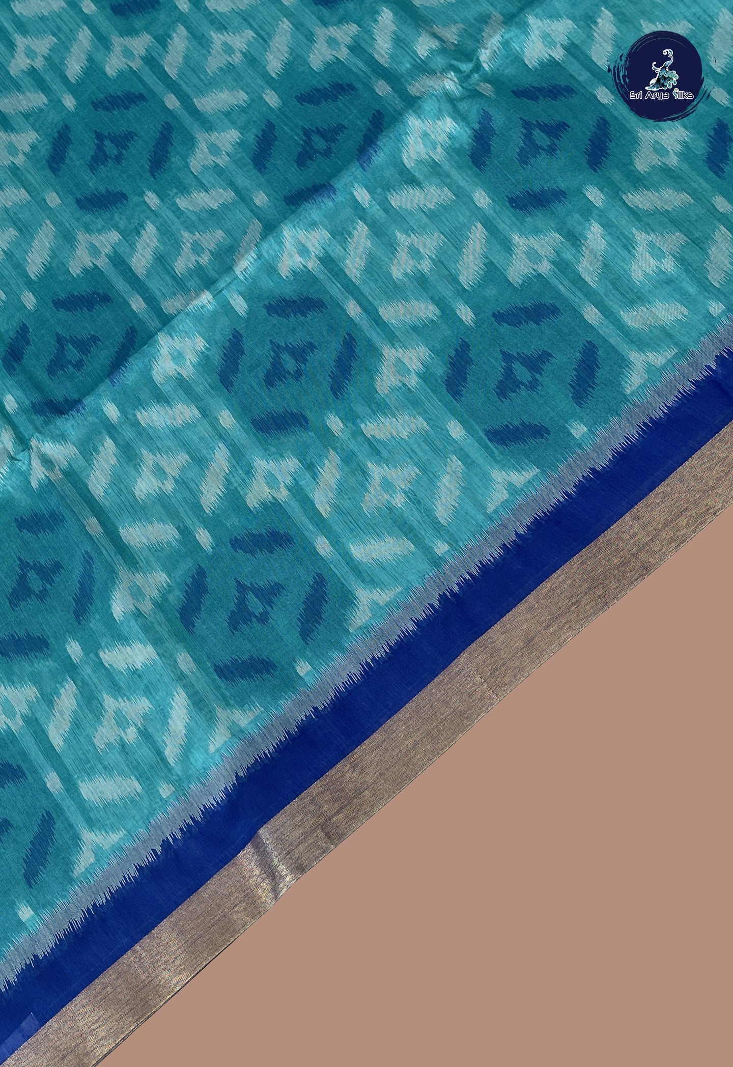 Teal Blue Semi Raw Silk Saree With Ikat Pattern