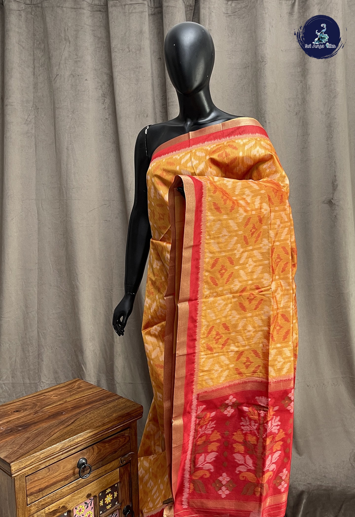 Lite Mustard Orange Semi Raw Silk Saree With Ikat Pattern