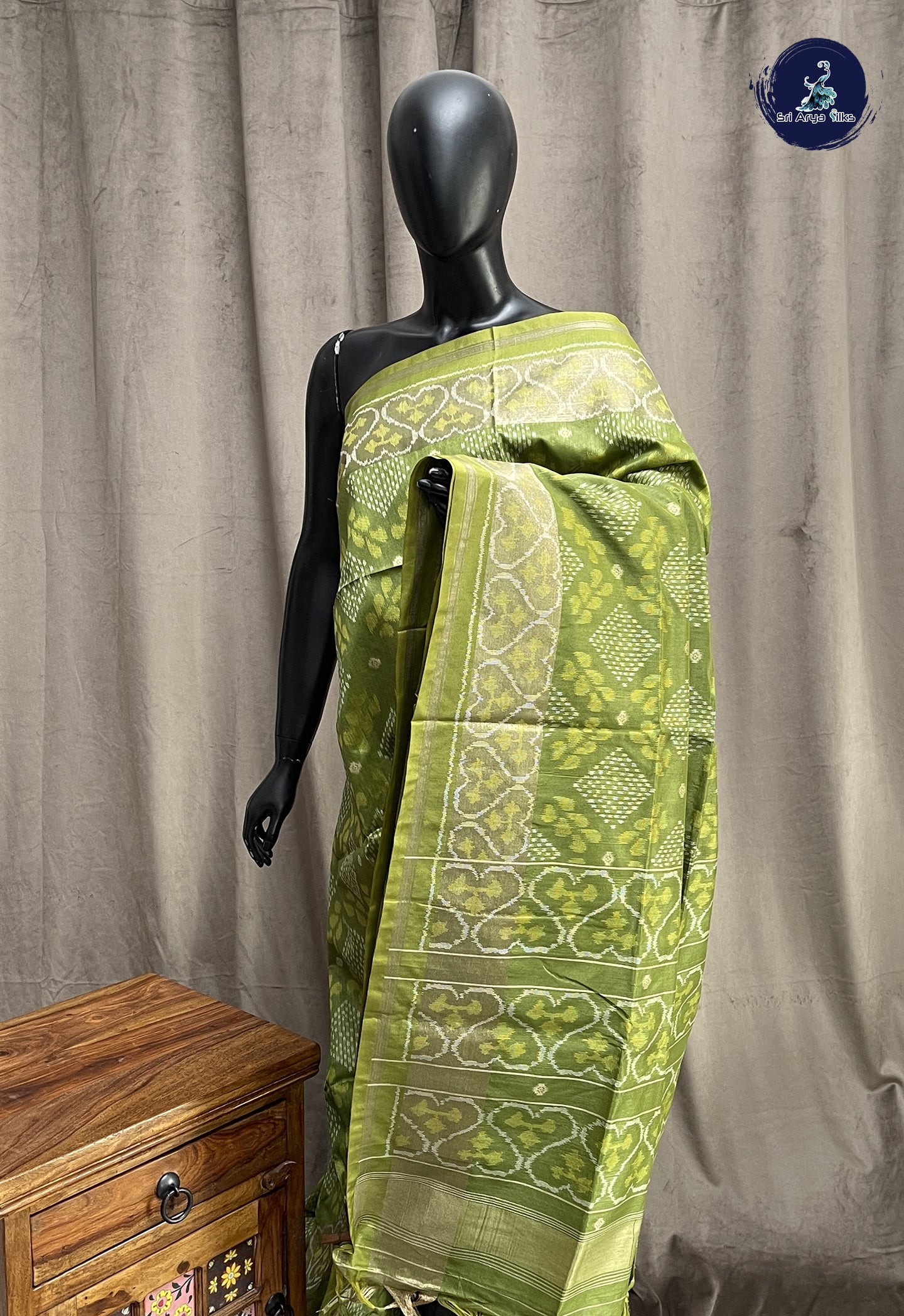 Mehendi Green Semi Raw Silk Saree With Ikat Pattern